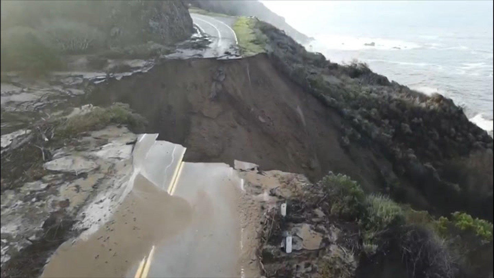 A debris flow washed away a section of Highway 1 in Big Sur, California, on Jan. 29. Flooding the day before caused the road to begin crumbling.