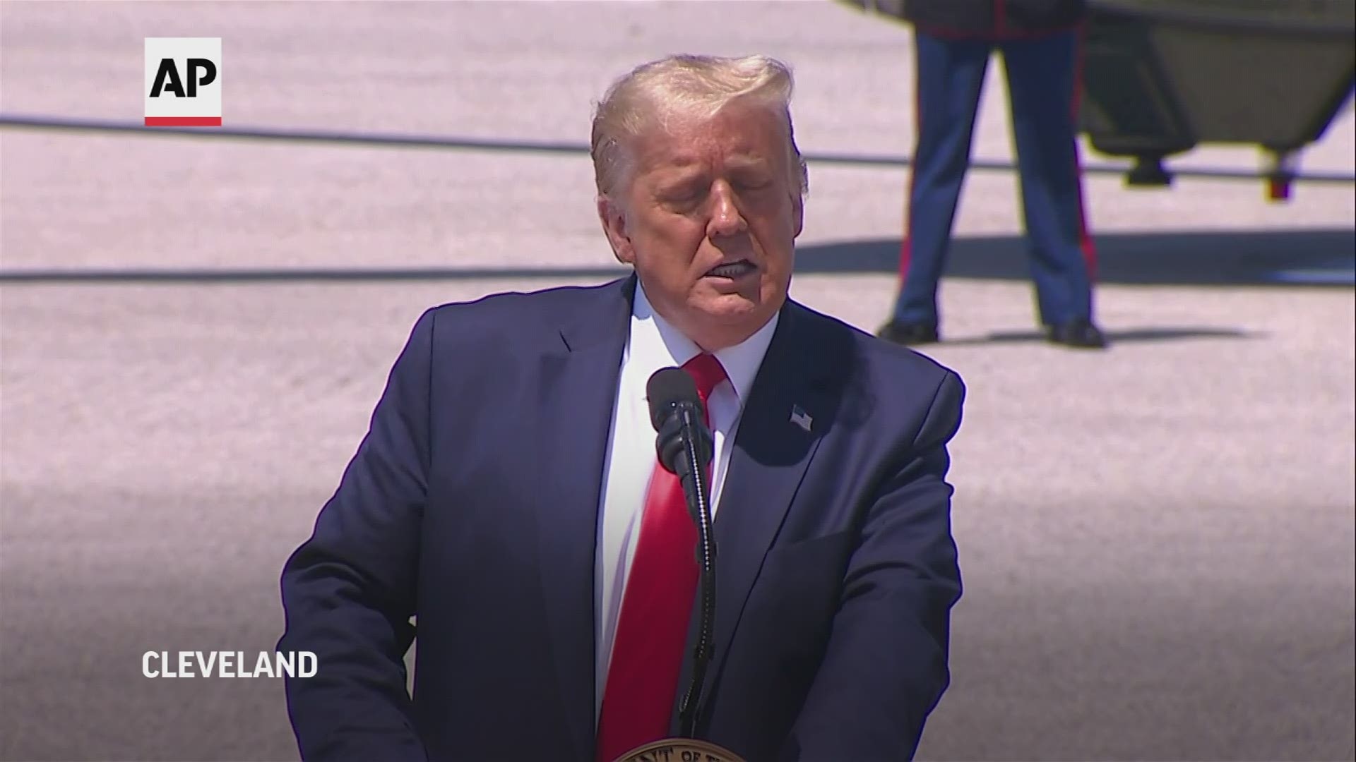 In campaign-style remarks as he landed in Ohio, President Donald Trump said his opponent, Joe Biden, a lifelong Catholic, "is against God" and will "hurt the Bible."