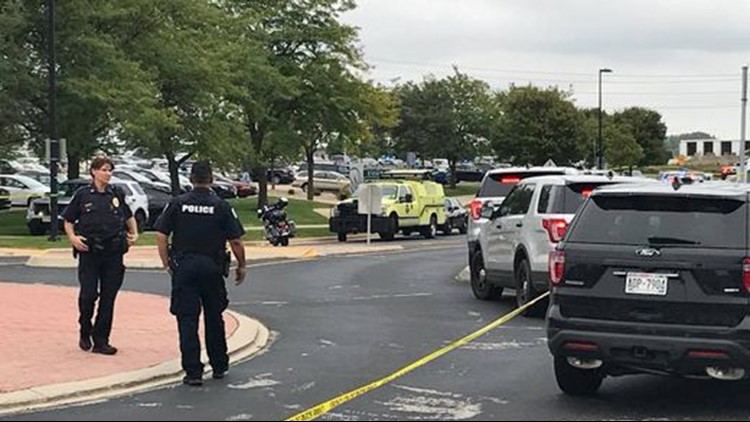 Wisconsin shooter dead after being shot by police Wisconsin shooter dead after being shot by police