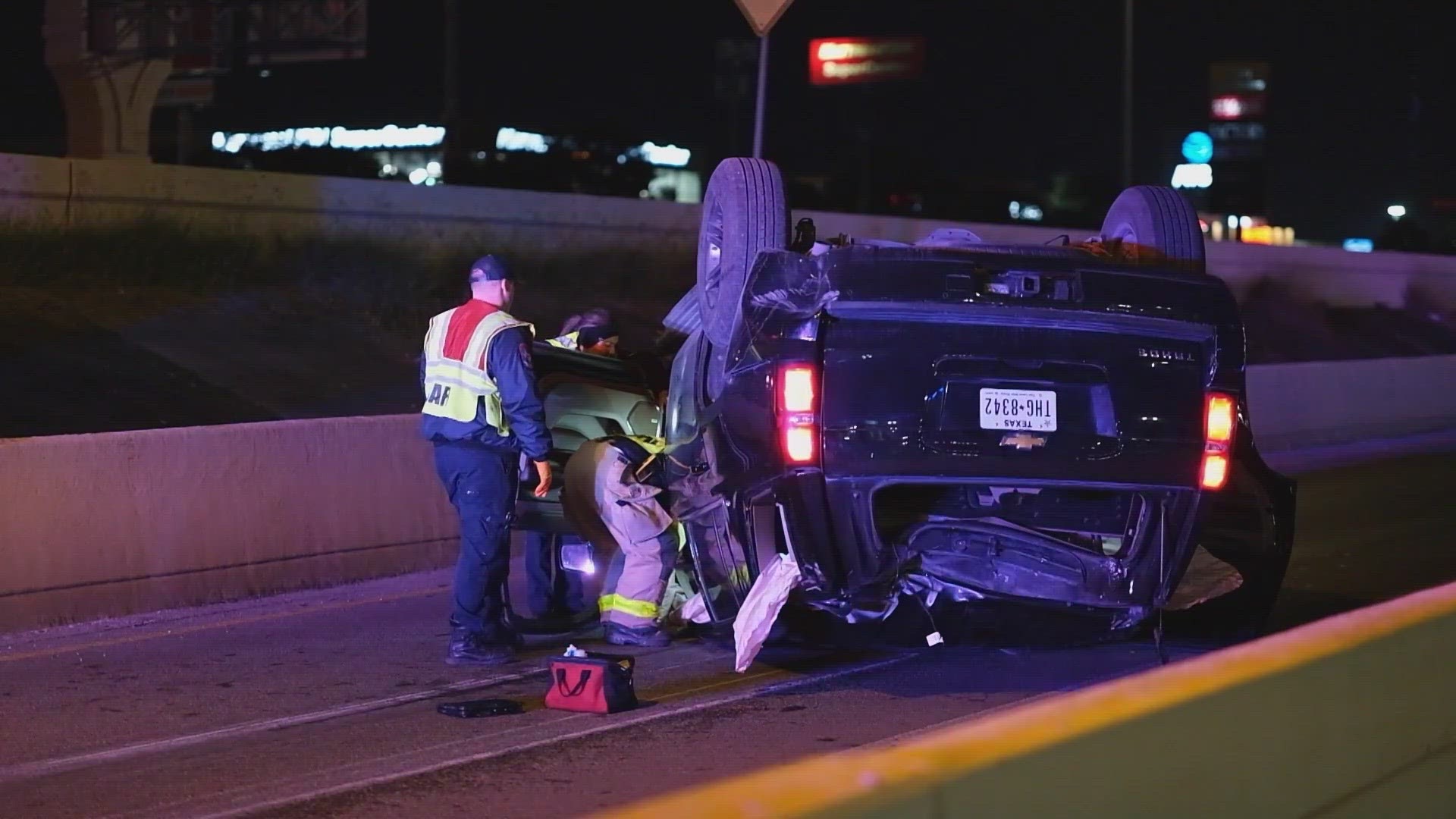 The woman told officers she dropped her phone on the floor of her car, and crashed into barrier when she tried to retrieve it while driving.