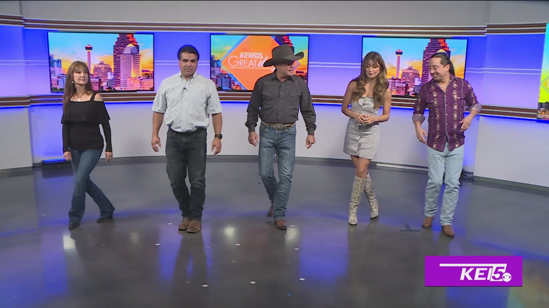 Dance Instructor David Callahan shows Roma and Paul how to line dance.