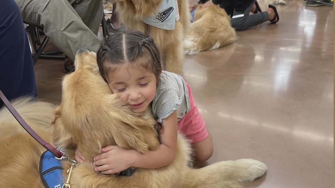 Furry friends from K-9 Comfort Dog Ministry help mourners in Uvalde