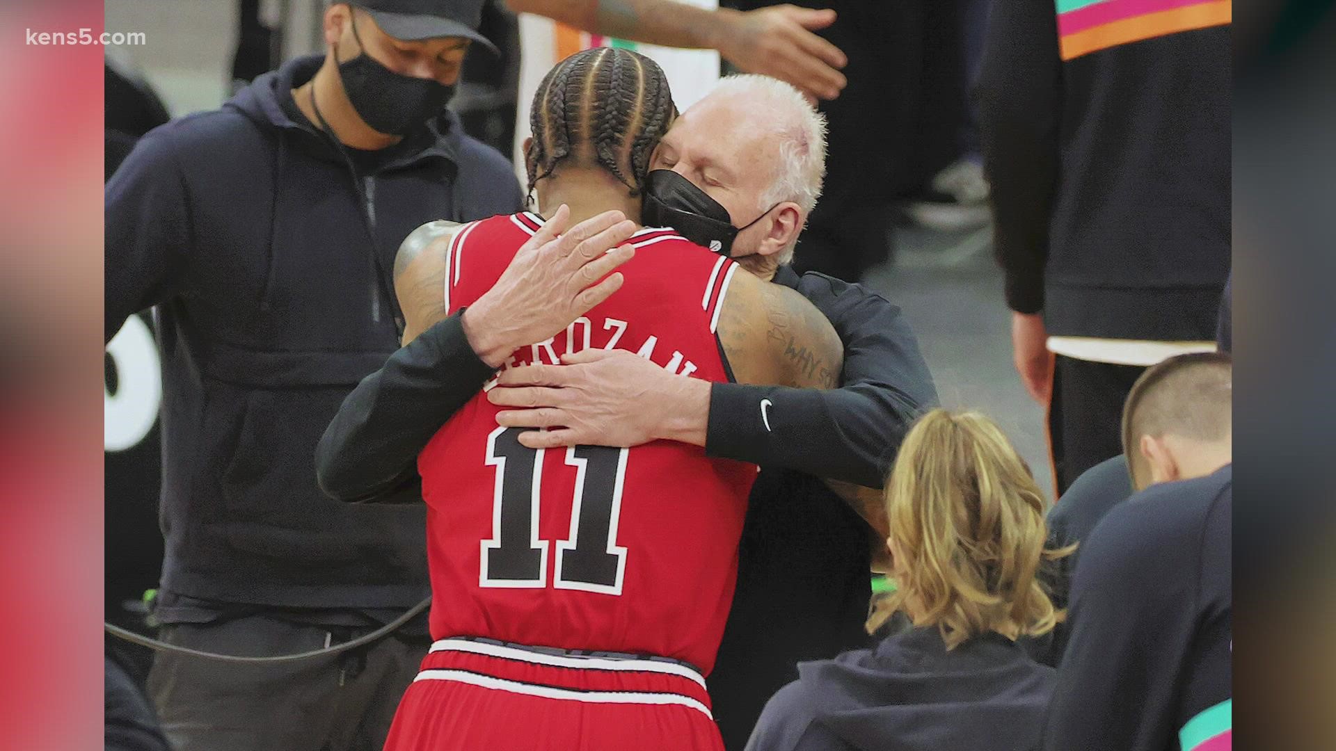 DeMar made his return to the AT&T Center in a Bulls uniform and Pop embraced like this.