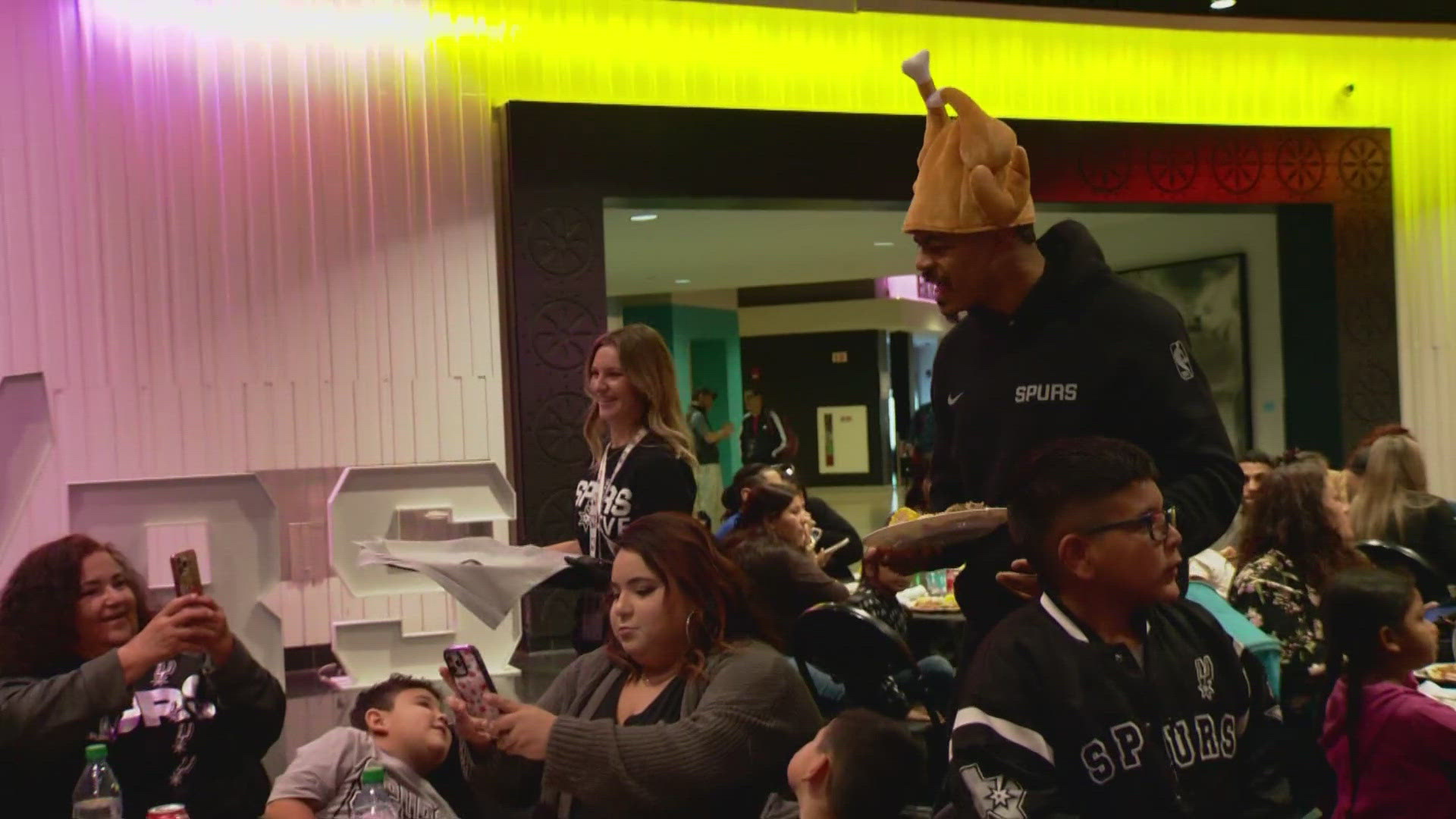 Spurs players, H-E-B and the San Antonio Food Bank held their food distribution.