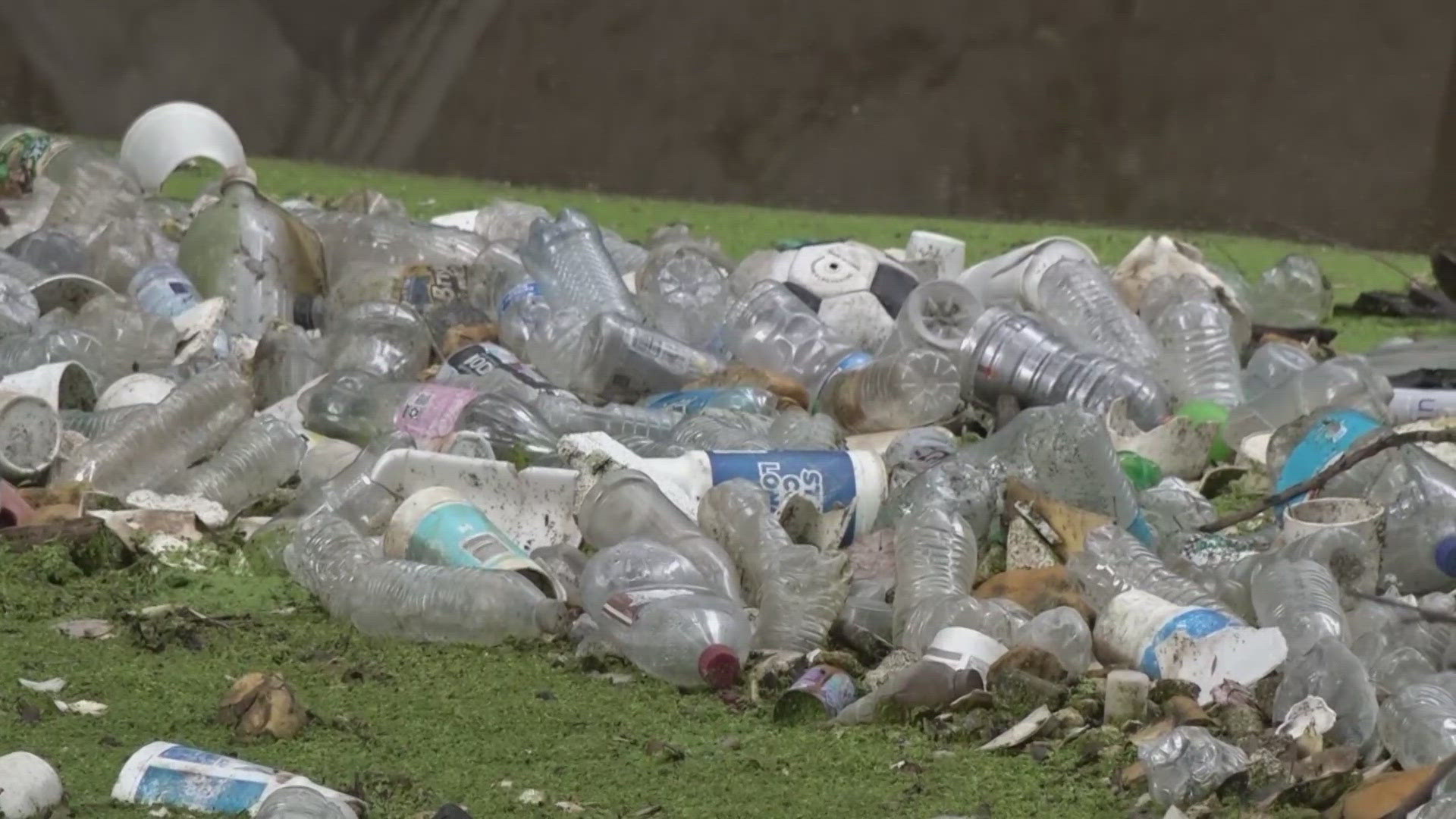 The trio spent Thursday surrounded by muck as they worked to remove a huge trash island from the middle of Salado Creek.