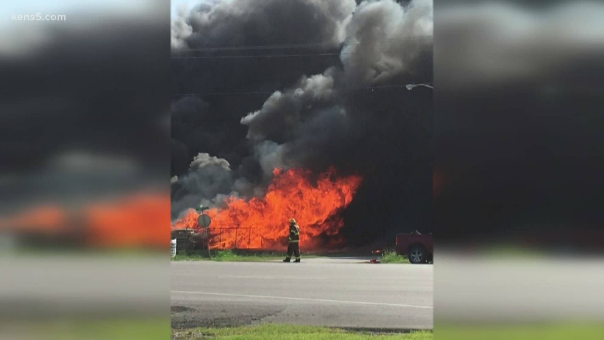 A massive fire that destroyed Newpark Drilling Fluids is put out but the leftover material that continued to burn overnight has caused smoke to pour into the air.