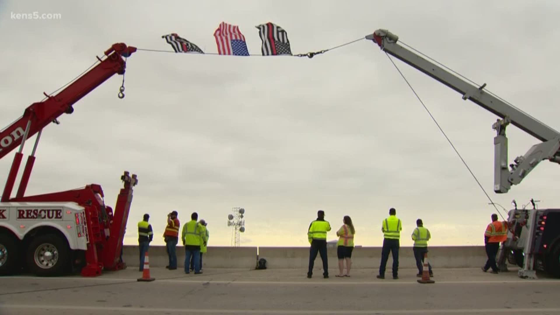 As the family, friends and colleagues of Greg Garza made their way to his funeral, community members and first responders stopped on overpasses to say, 'Thank you.'