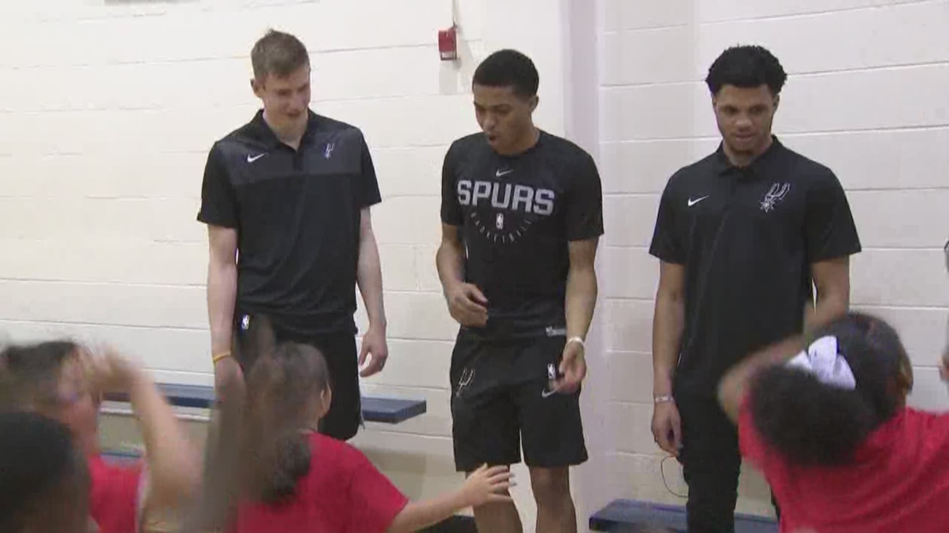 The Spurs wasted no time in getting their three 2019 draft picks out into the community Tuesday, sending them to participate in a basketball clinic at the Eastside Boys & Girls Club.