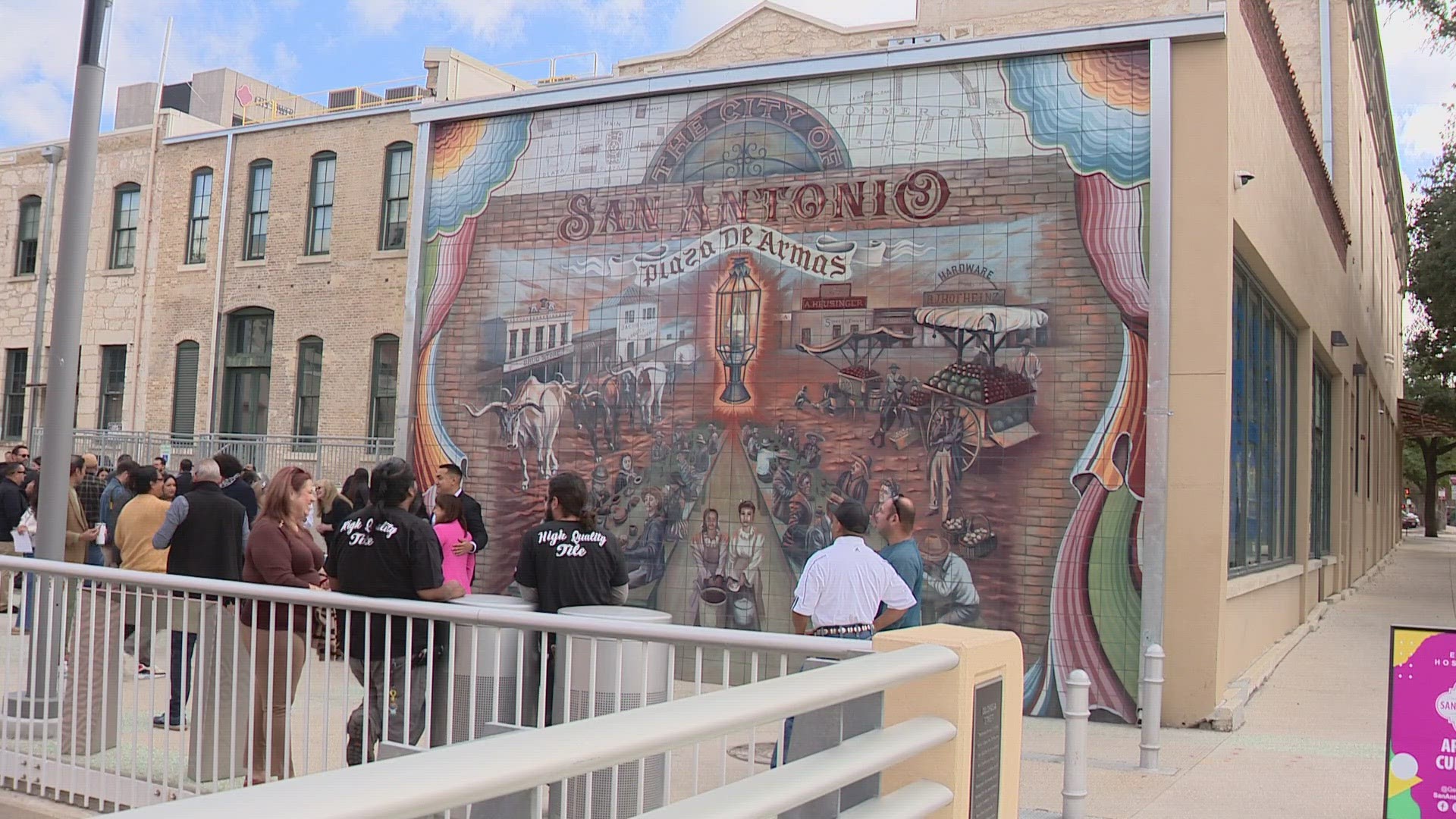 Ribbon cutting for new large scale tile mural that tells the story of historic plaza de armas
