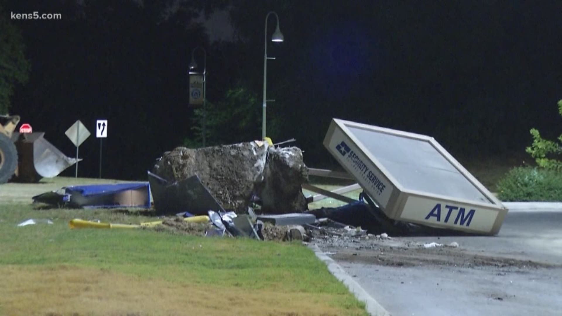 Men try to steal ATM with front loader, police say