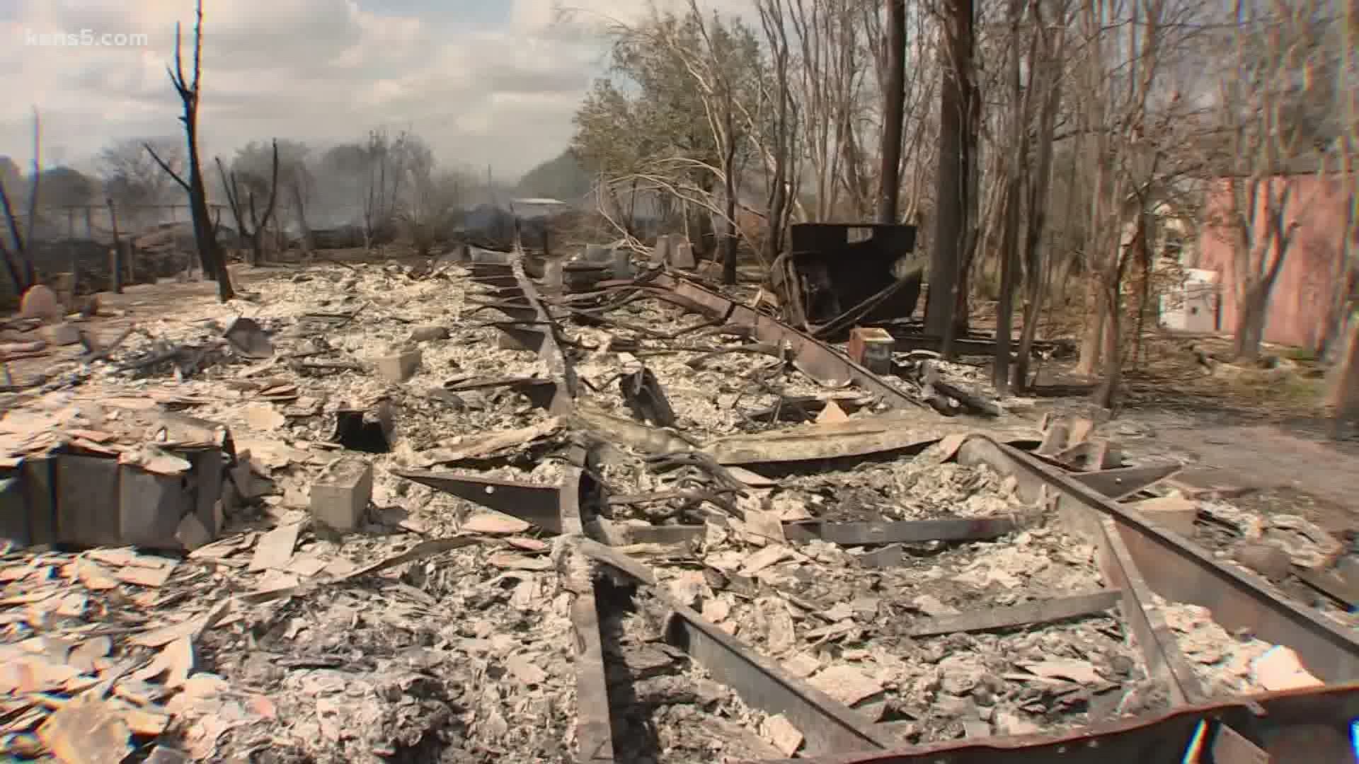 Fire investigators are looking into the cause of a blaze that sent smoke plumes that could be seen form miles in Atascosa County.