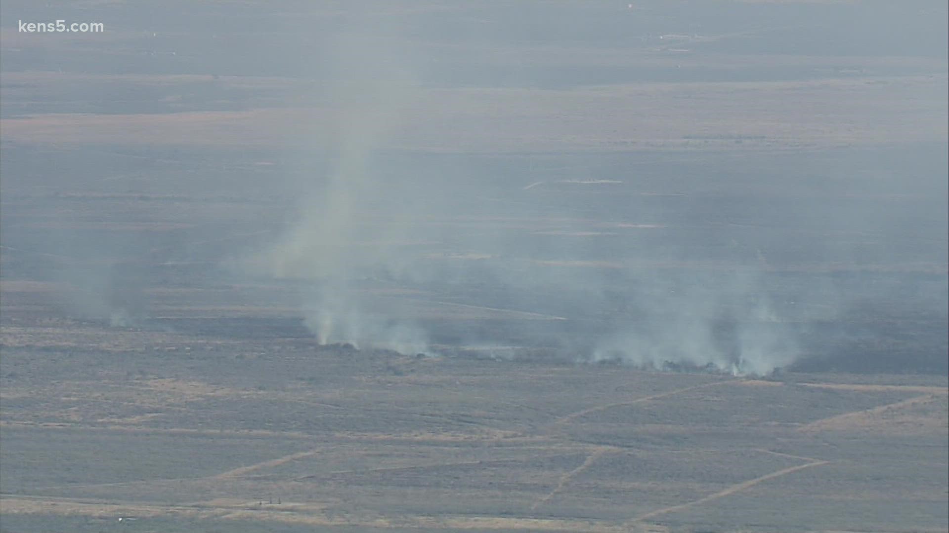 The fire is about 12 miles south of Poteet along FM RD 3387 & Hwy 16, near the town of Christine.