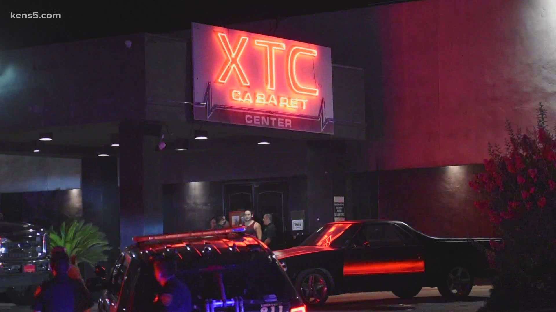 A man was shot by a security officer at a gentleman's club after the man went to his car, grabbed an AK-47 and started shooting, per SAPD.