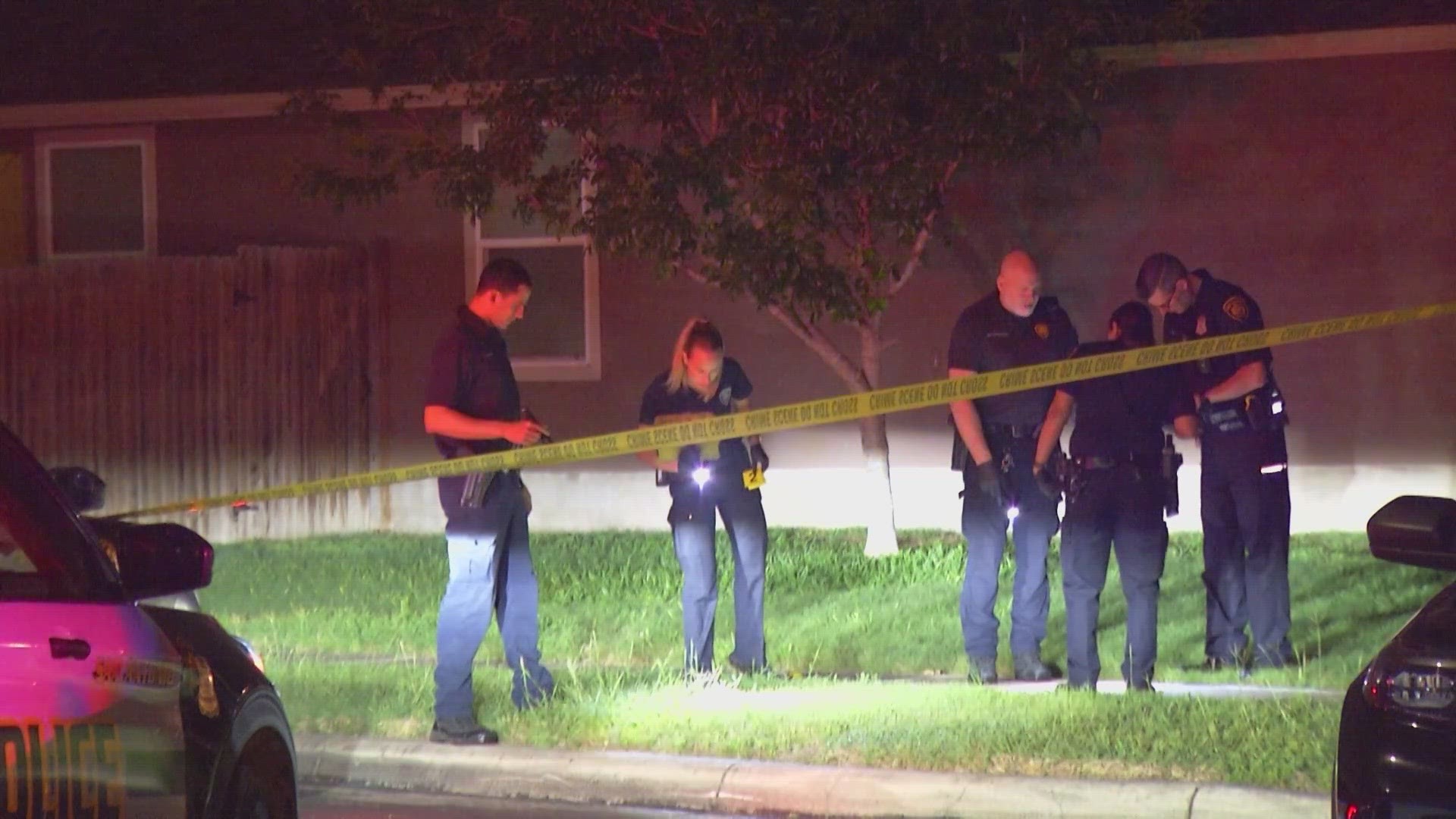 Woman found dead in her garage, man in critical condition after being shot