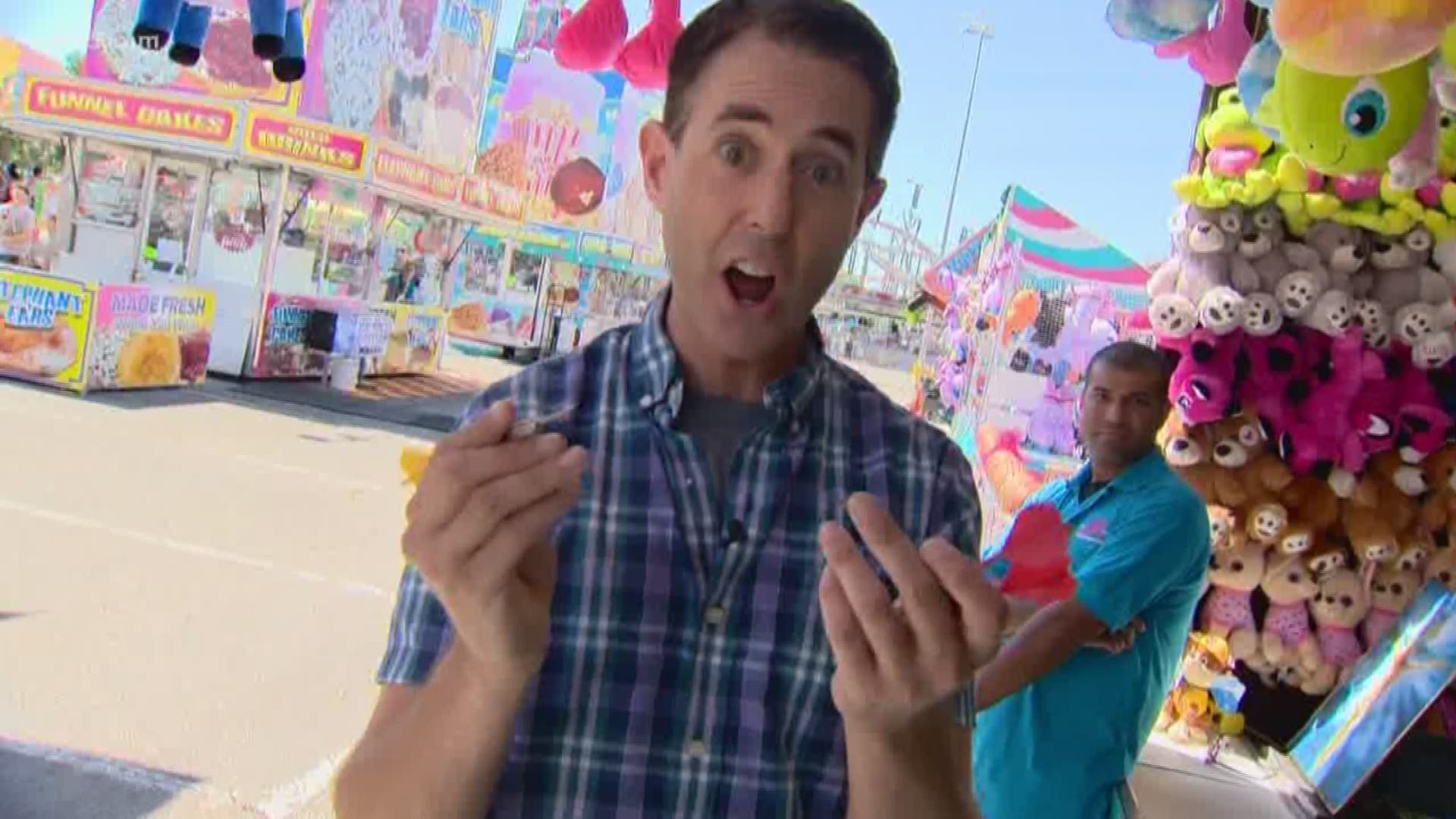 KENS 5's Jeremy Baker visited the event to find out which carnival games are easiest and which had him pulling his hair out.
