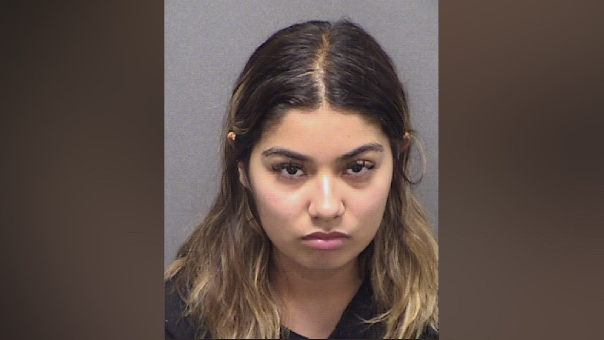 An arrest affidavit showed Maria Martinez, 20, is facing a charge of making terroristic threats.