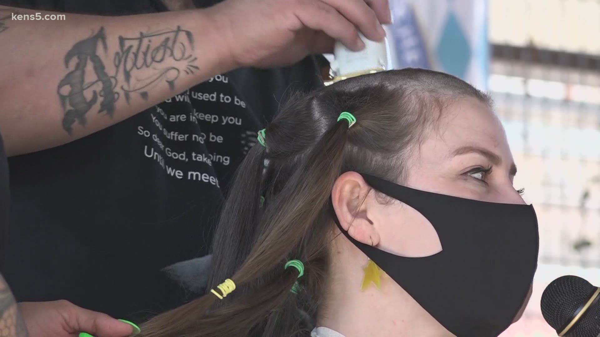 Dozens of people gave up their locks in order to raise money and awareness in the ongoing cancer fight.