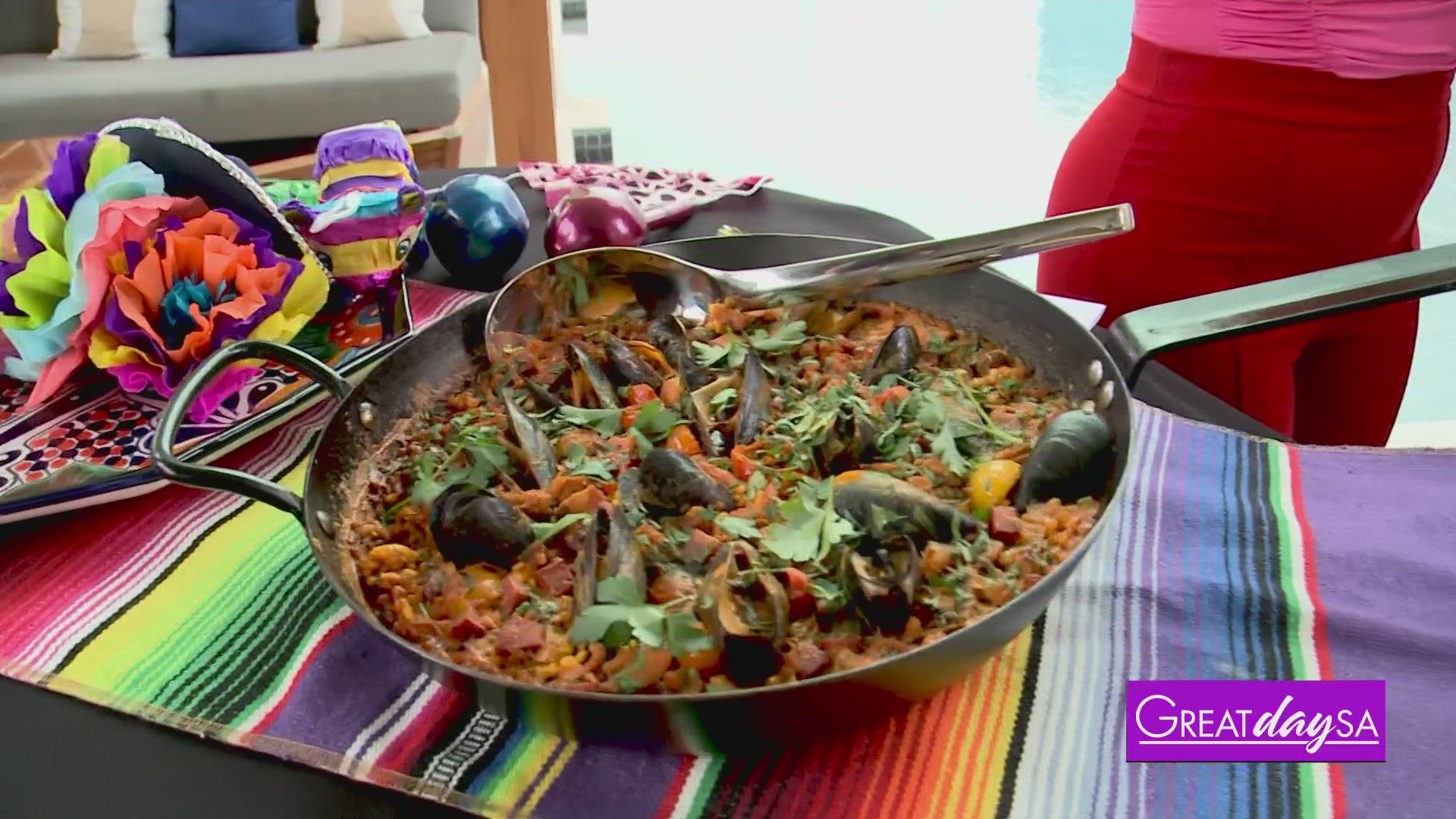 Executive Chef Robert Cantu with Thompson San Antonio cooks up a delicious Spanish paella in preparation for their Fiesta Block Party Celebration this weekend.