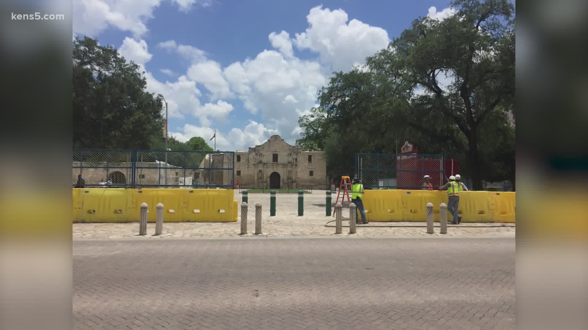 A statement says that the fencing on Alamo Plaza will remain in place, "as long as events indicate it is needed."