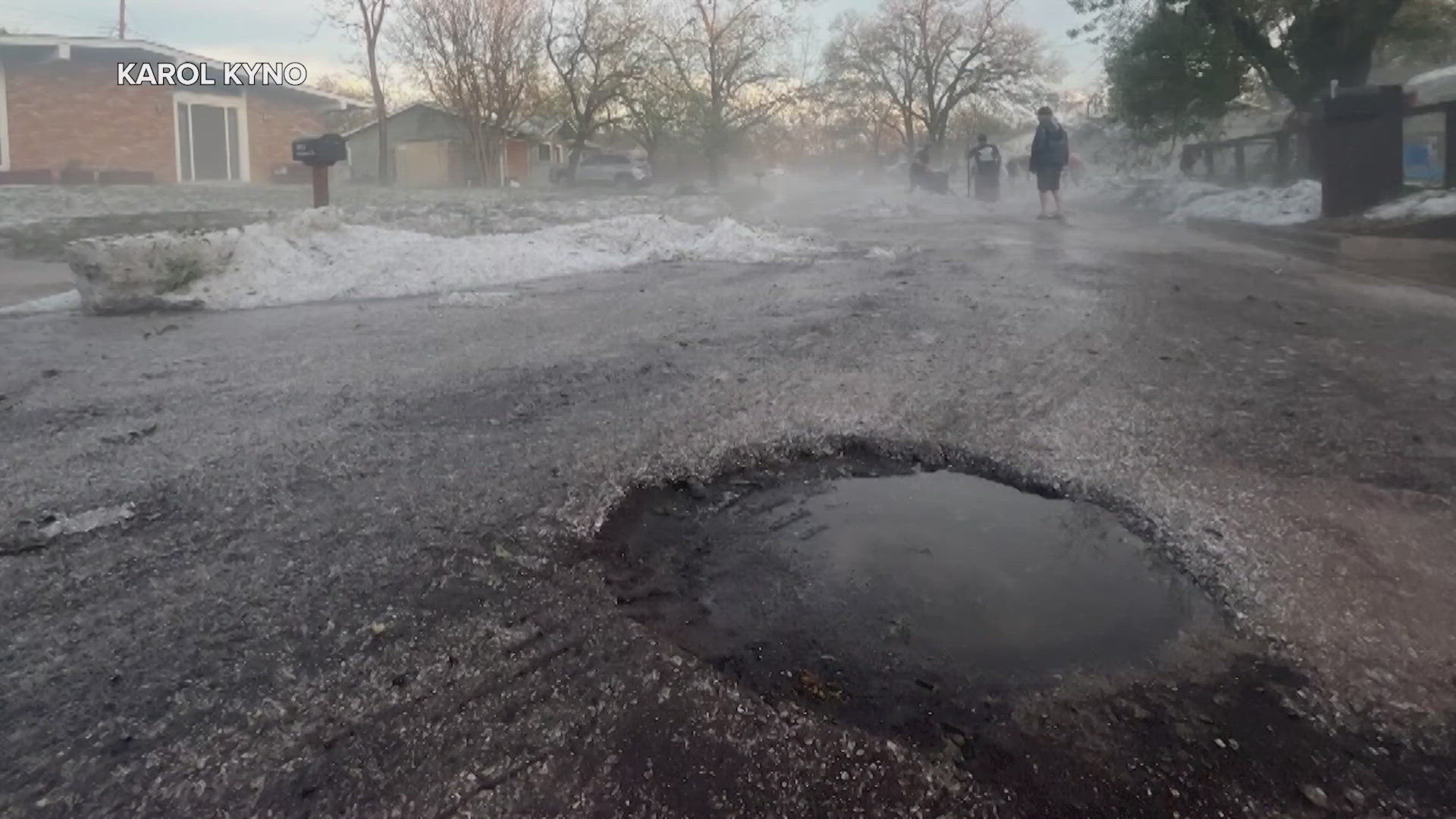 Homeowners near Windsor Park got hit with so much hail, they had to shovel streets, driveways and potholes.