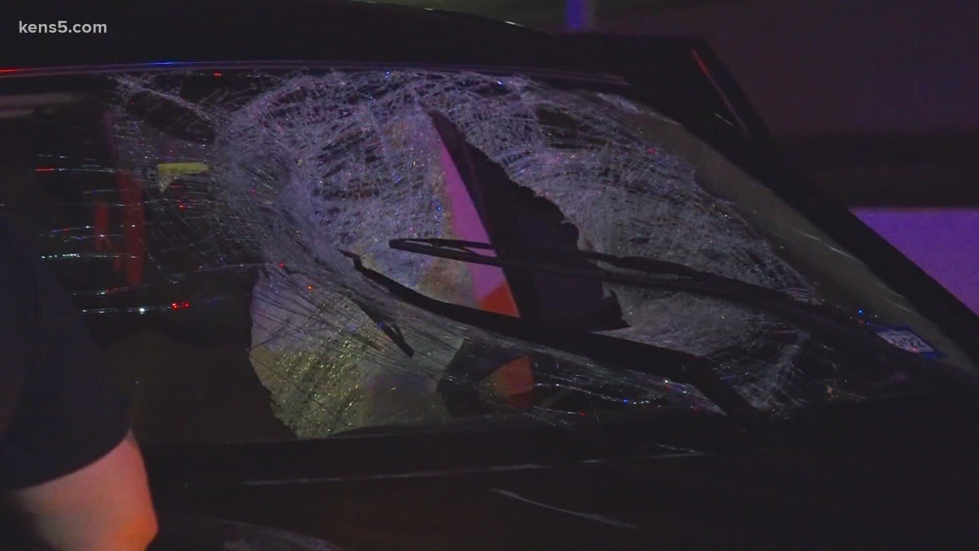 The victim was driving when someone tossed a cinderblock off of the New Braunfels bridge. The cinderblock fell through the woman's window, breaking her arm.