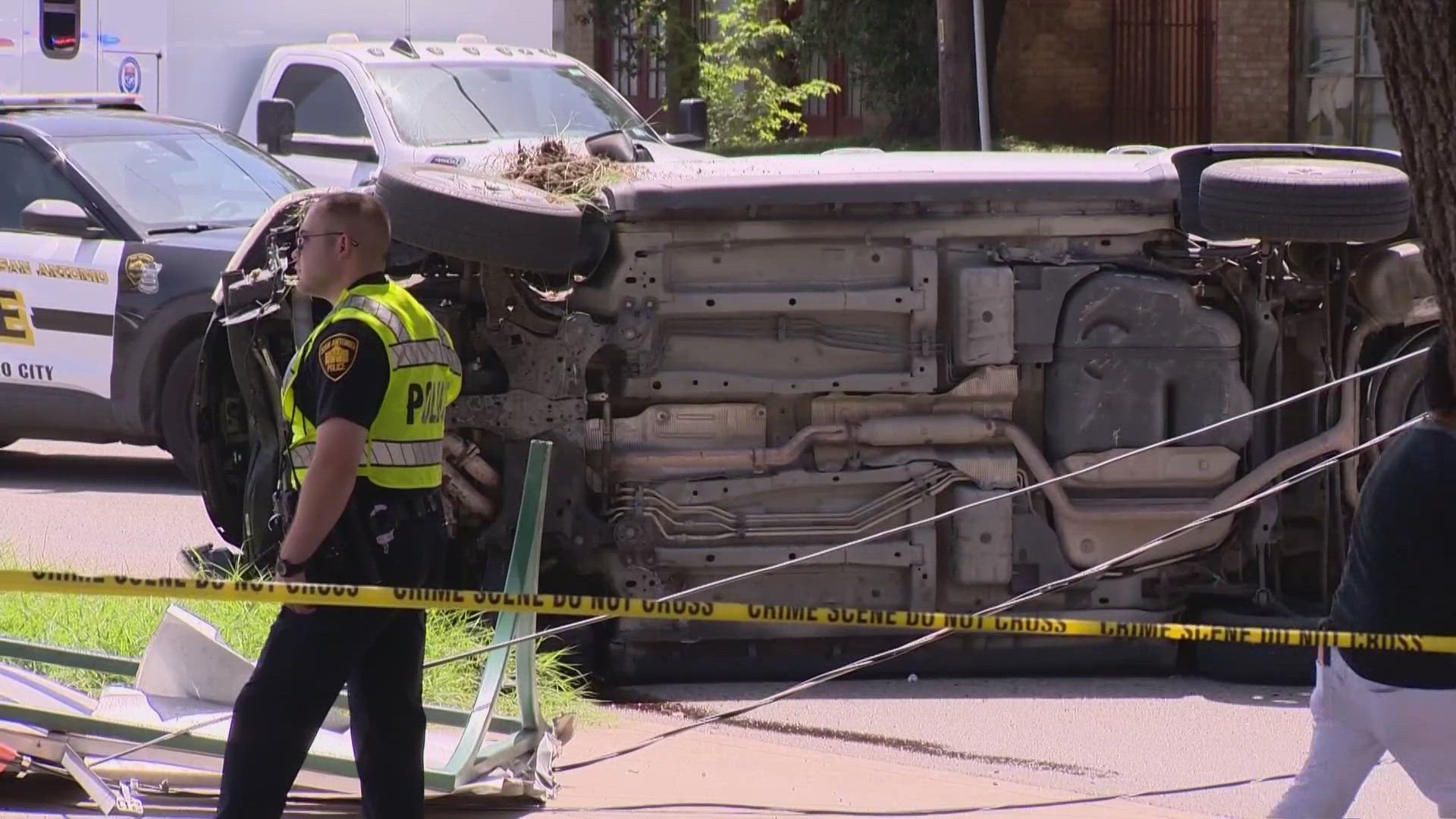 Police say the car jumped the curb and barreled into the bus stop where at least three people were waiting for the bus.