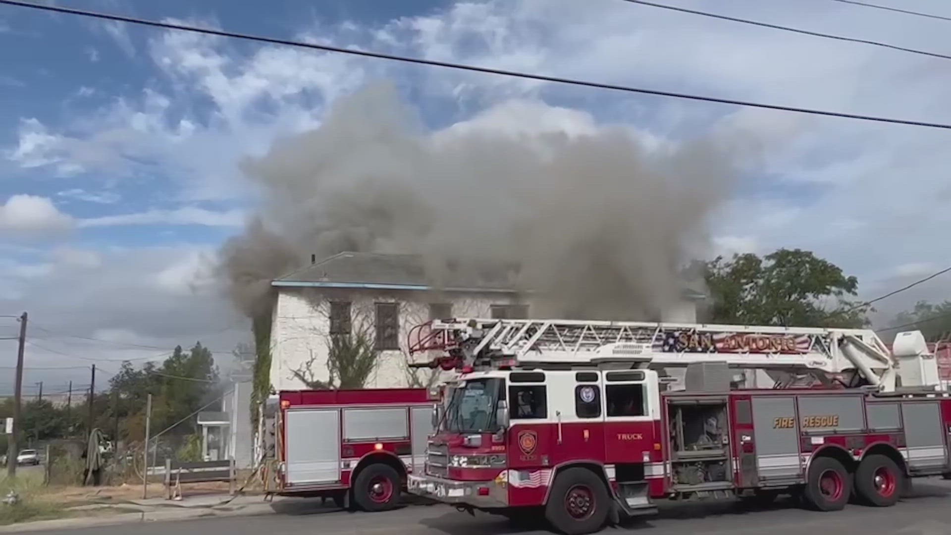 When firefighters arrived, smoke was pouring out of the second story of the building.