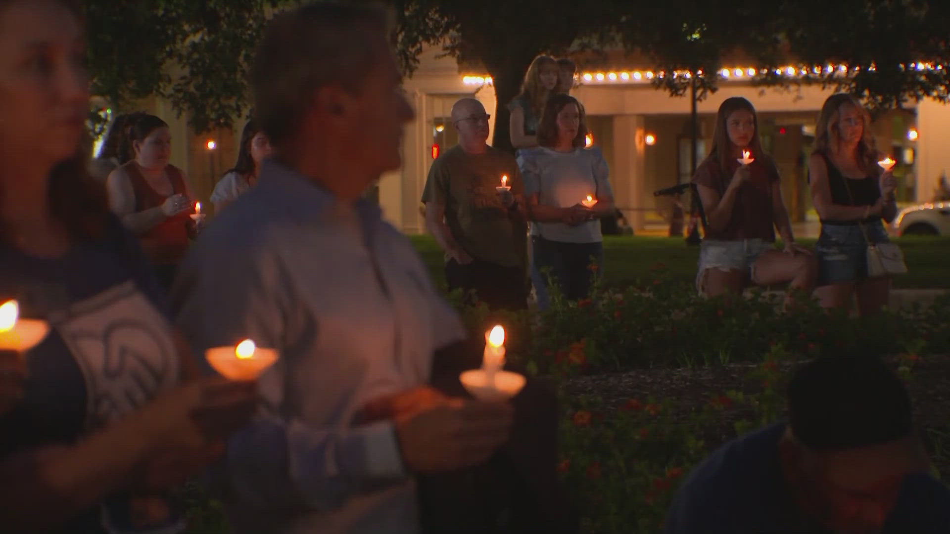 The San Antonio community gathered at Travis Park on Monday for a vigil and donation drive for those affected by the deadly floods.