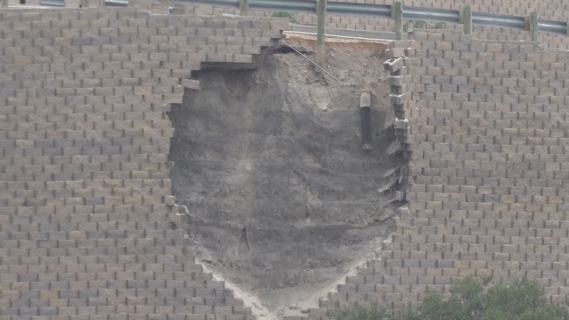 Collapsing retaining wall near Cedar Creek Golf Course causing concerns
