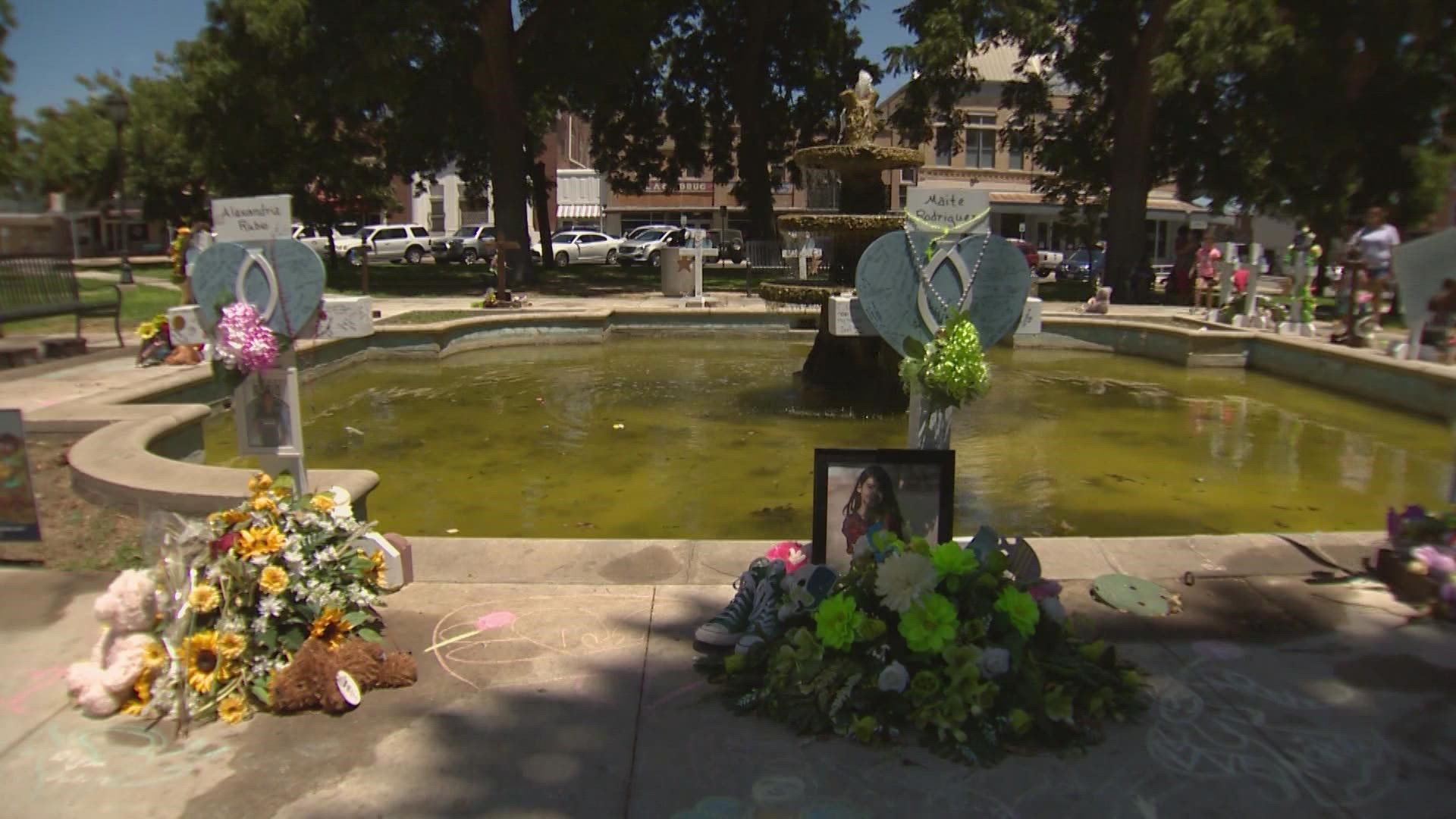 The group “We Are Your Voice” posted photos of the Robb Elementary victims on trees in Uvalde’s downtown plaza after items from temporary memorials were moved.