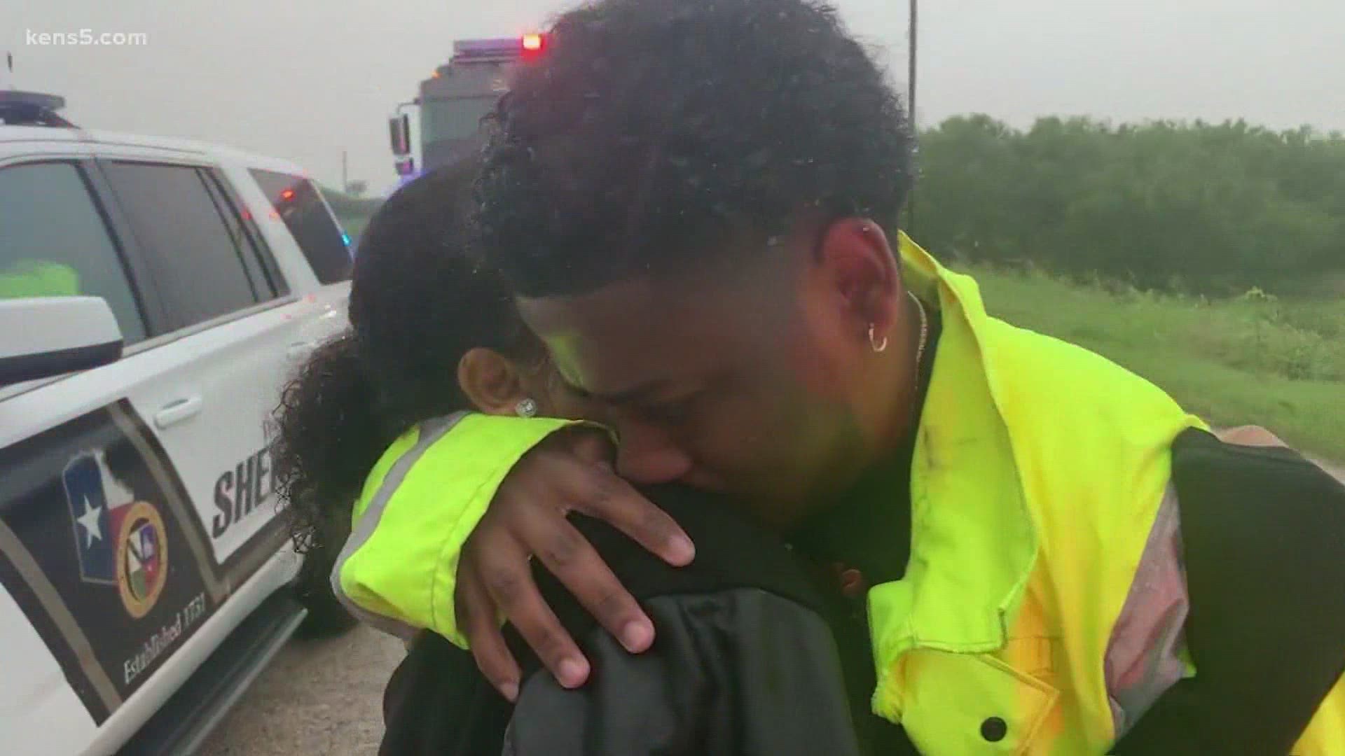 Two siblings had to be rescued after climbing to the top of their car.