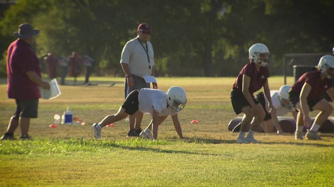 Two-a-day football practices begin amid historic heat wave