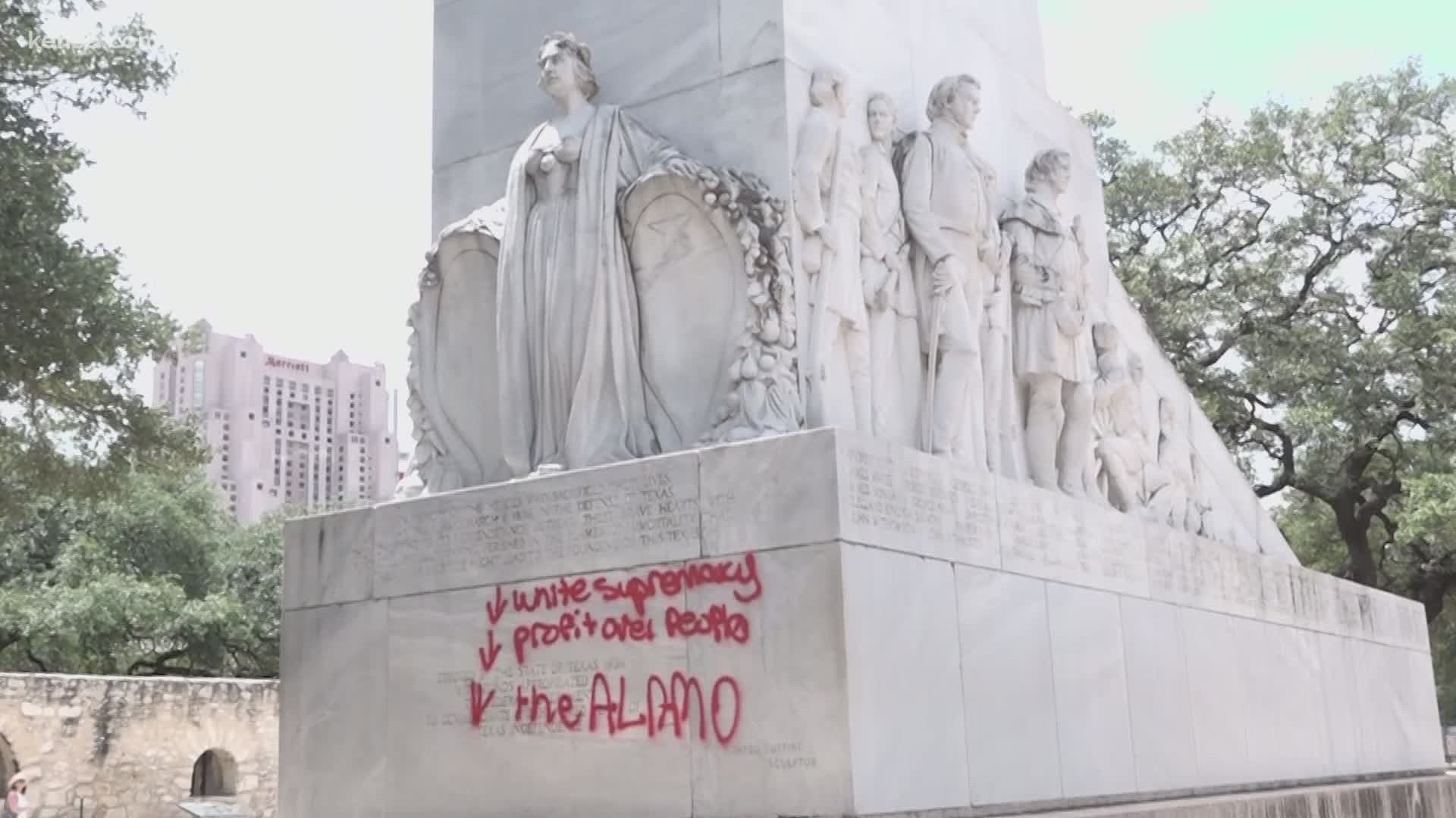 Red spray paint was found to have been used to leave words on the cenotaph in Alamo Plaza, among them "profit over people" with a downward-facing arrow.