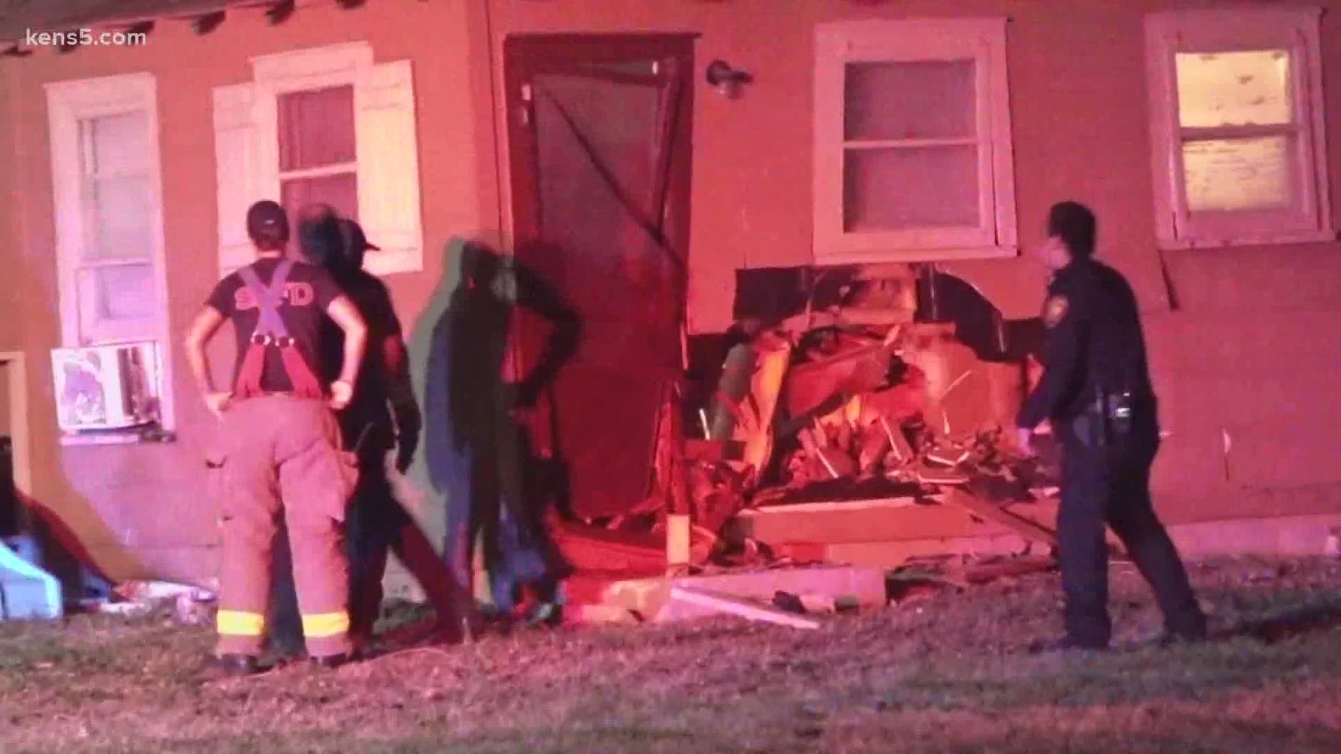 A car crashed into the side of a home, but the driver took off on foot and has not been found, the San Antonio Police Department said.