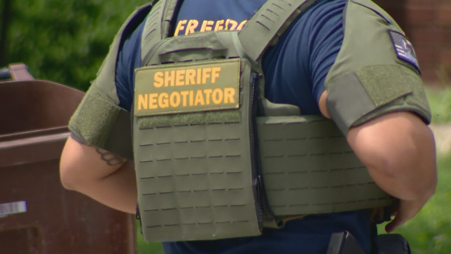 The man allegedly barricaded himself with a child inside a home on Saylers Creek.