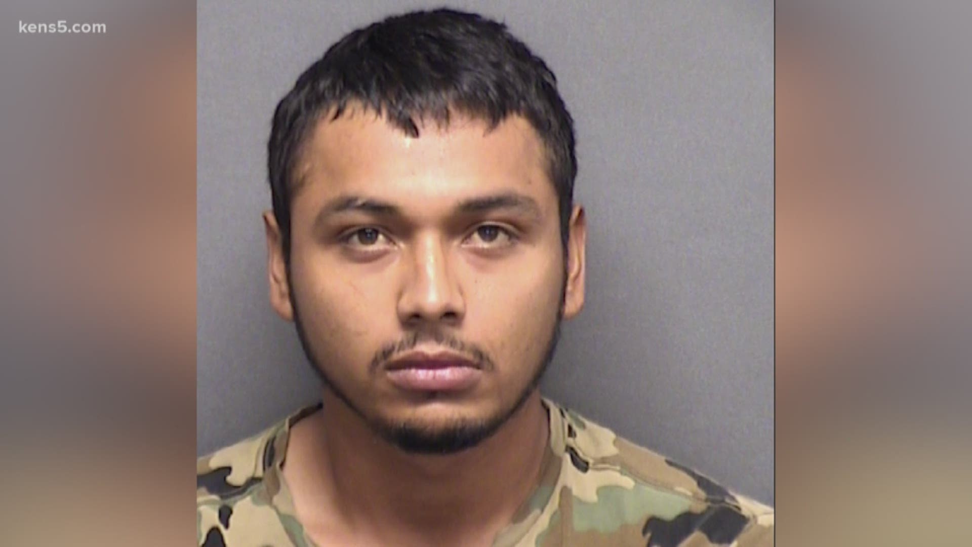 Police say Jose Menjiavar grabbed a former girlfriend by her ponytail and dragged her down the street with his car.