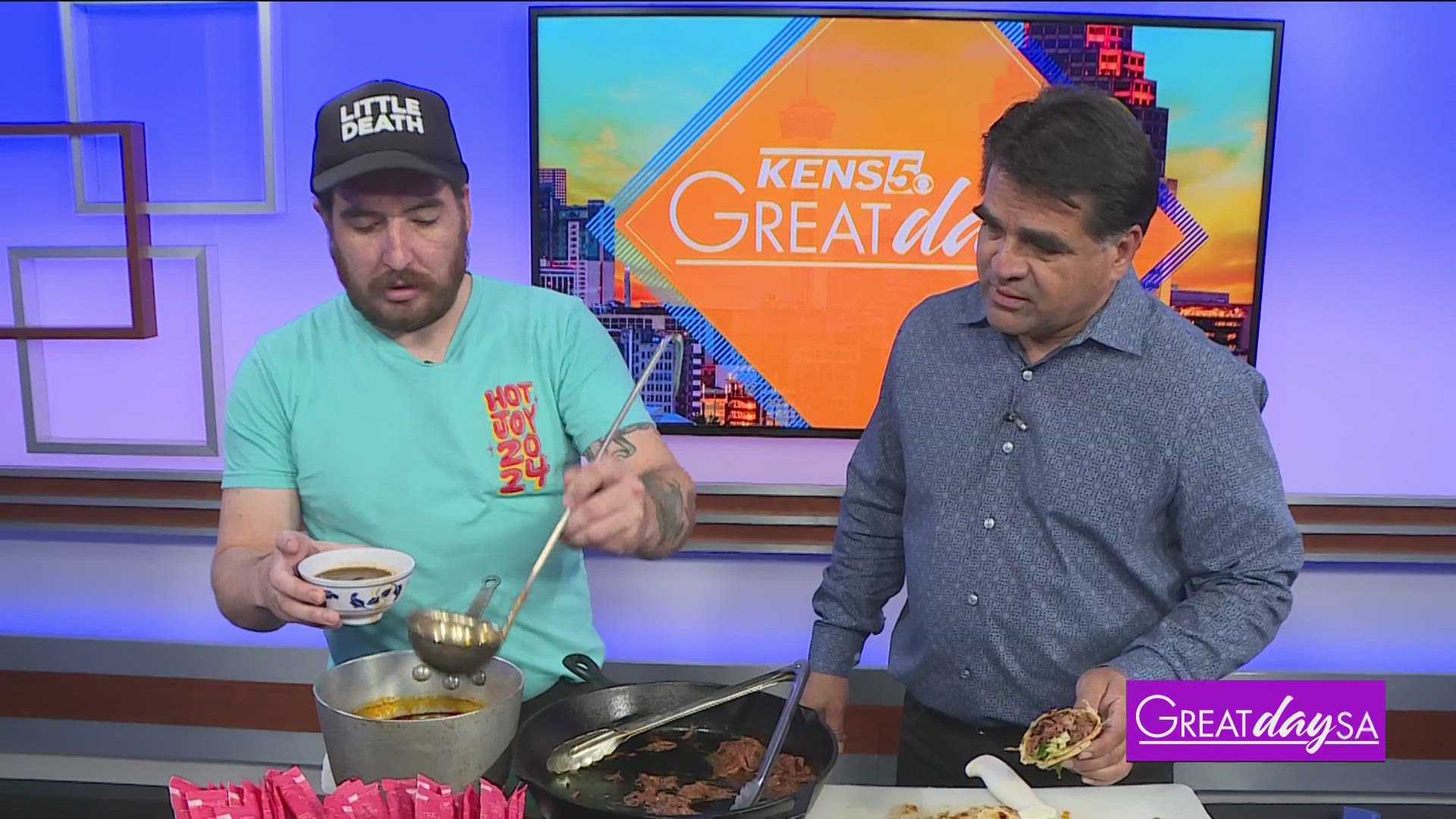 Paul helps cook up an asian-fusion dish with Executive Sous Chef Alex Roth of Hot Joy.