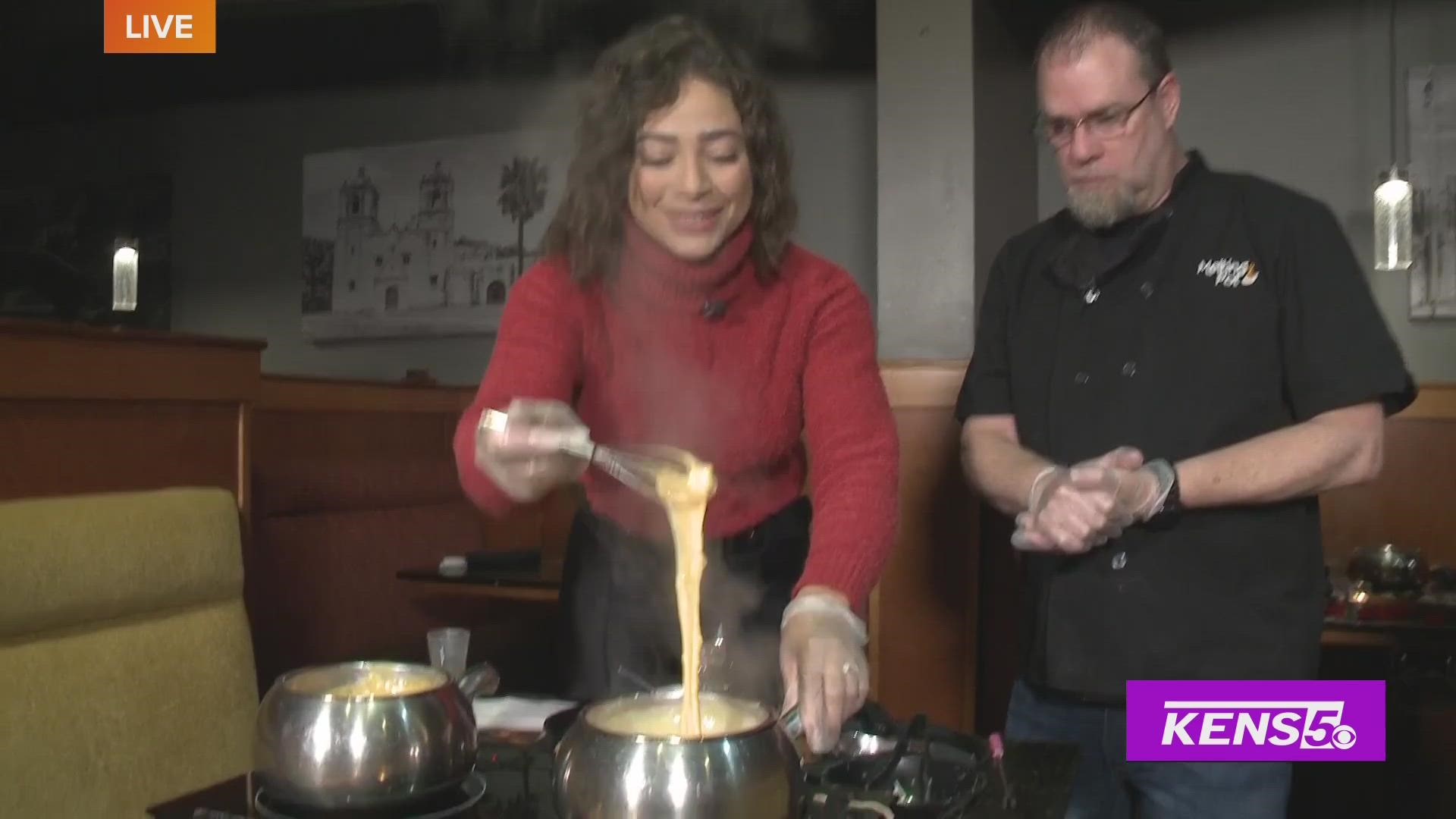 Corey Foust with The Melting Pot shows Clarke how to prepare the perfect cheese fondue.