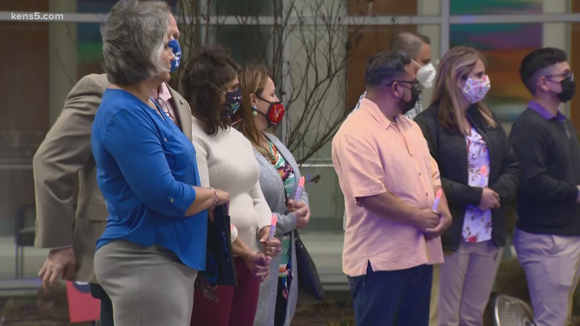 Community members gathered outside Methodist Hospital, which received its first COVID-19 patient a year ago.