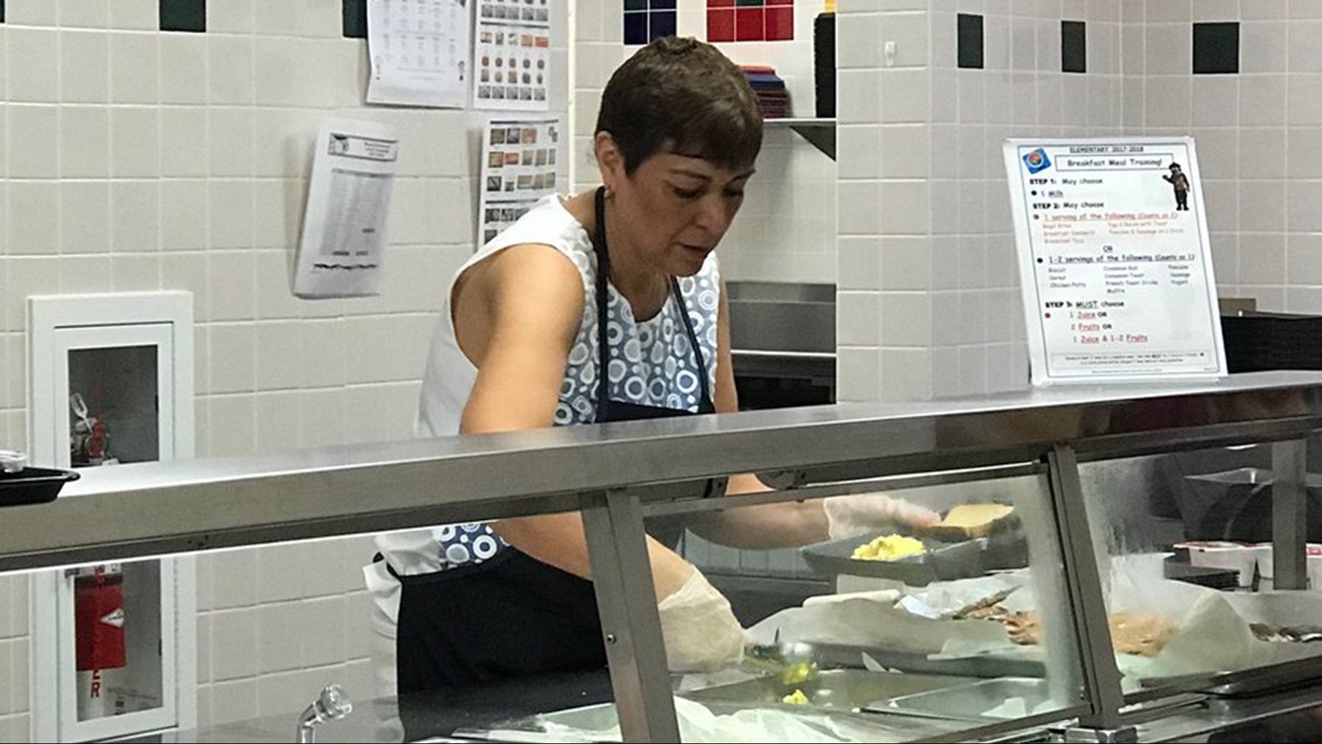 Mead Elementary principal serves breakfast during cafeteria staff shortage