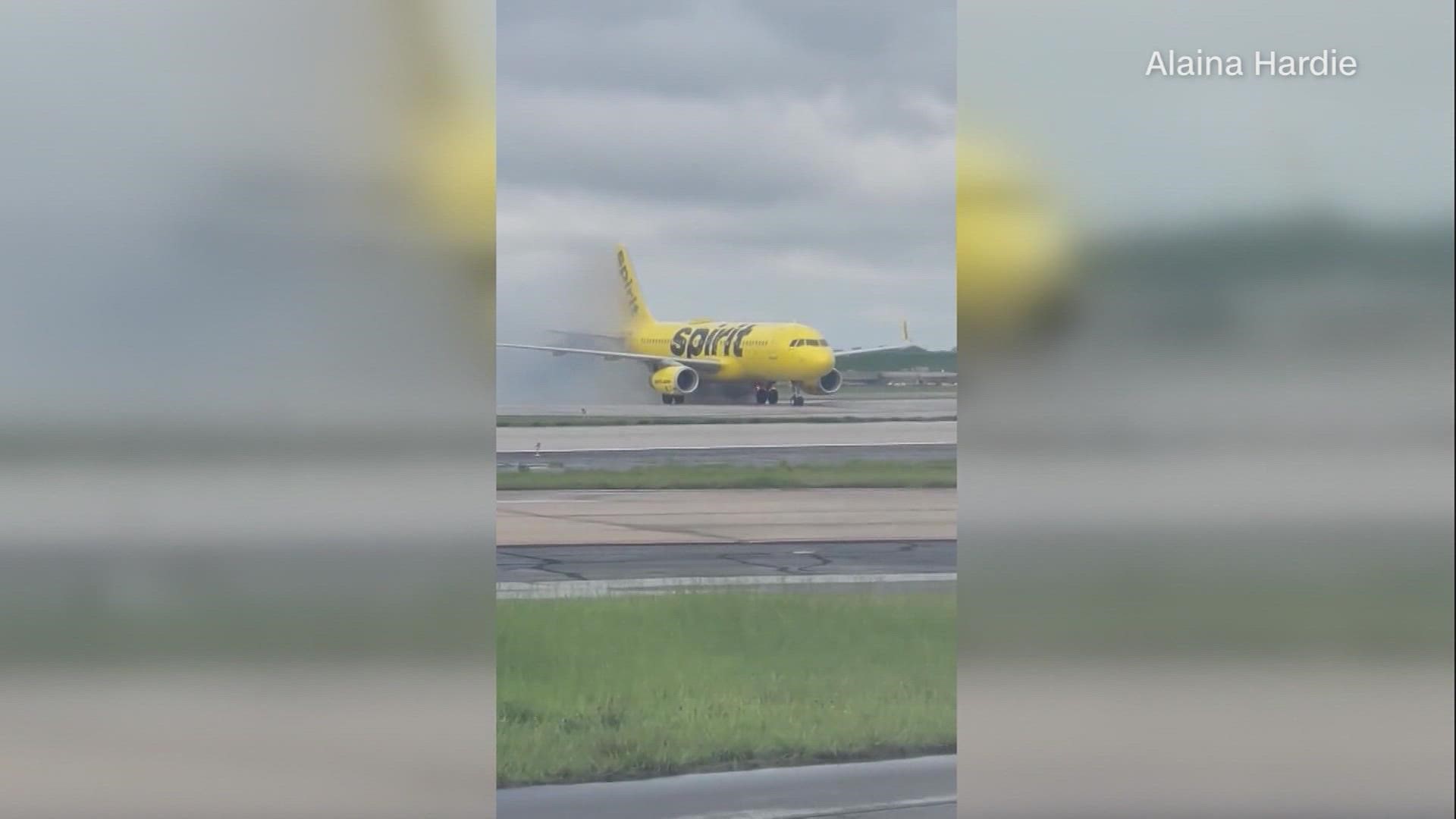 Atlanta firefighters extinguished the fire and the plane was towed to the gate.