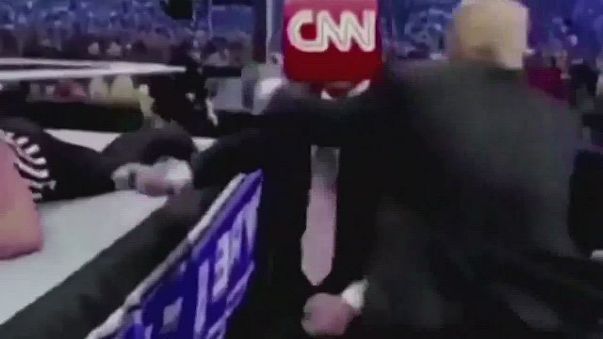 CNN grapples with Trump's wrestling video