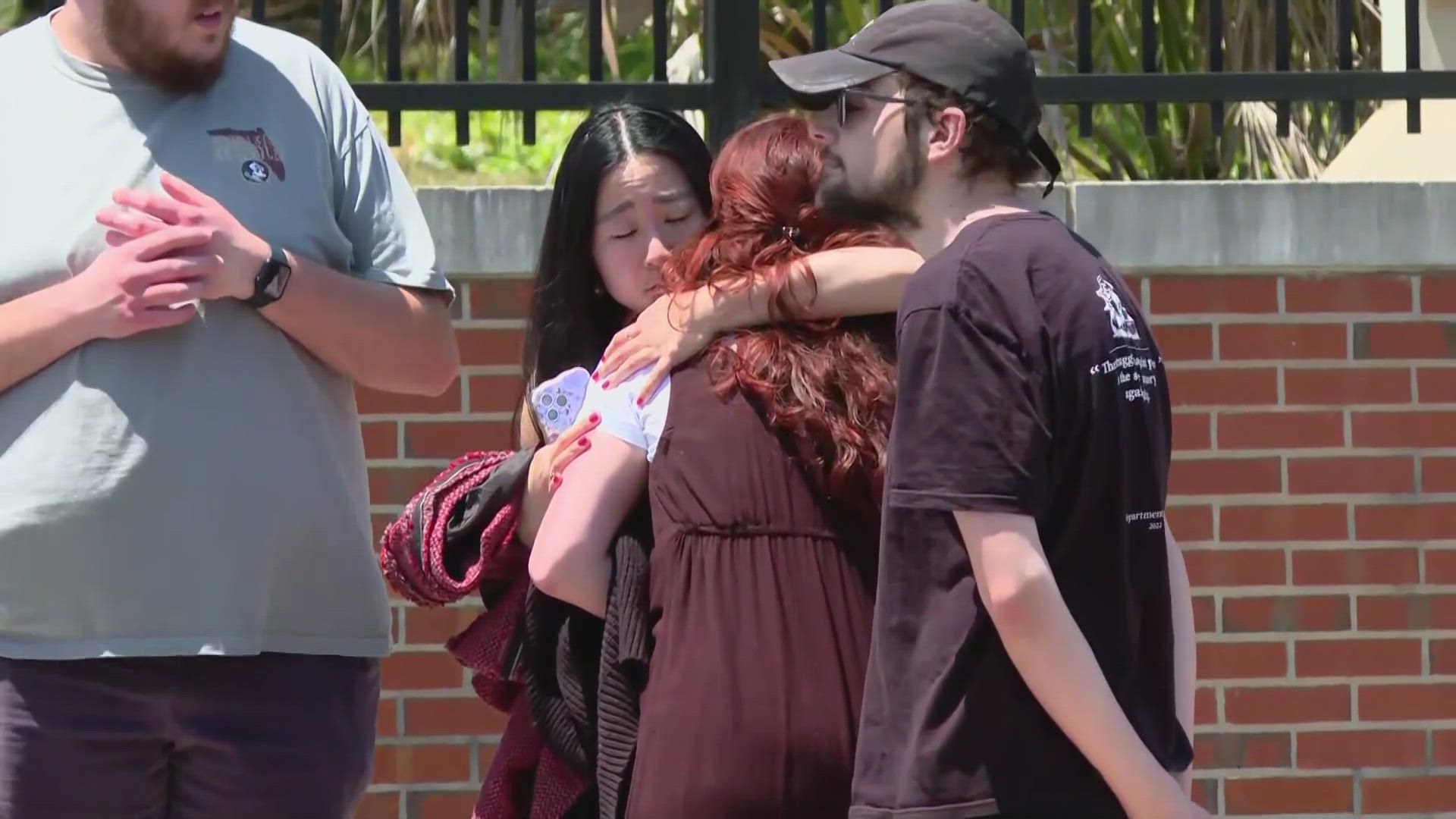 The alleged student was taken into custody after being shot by police.