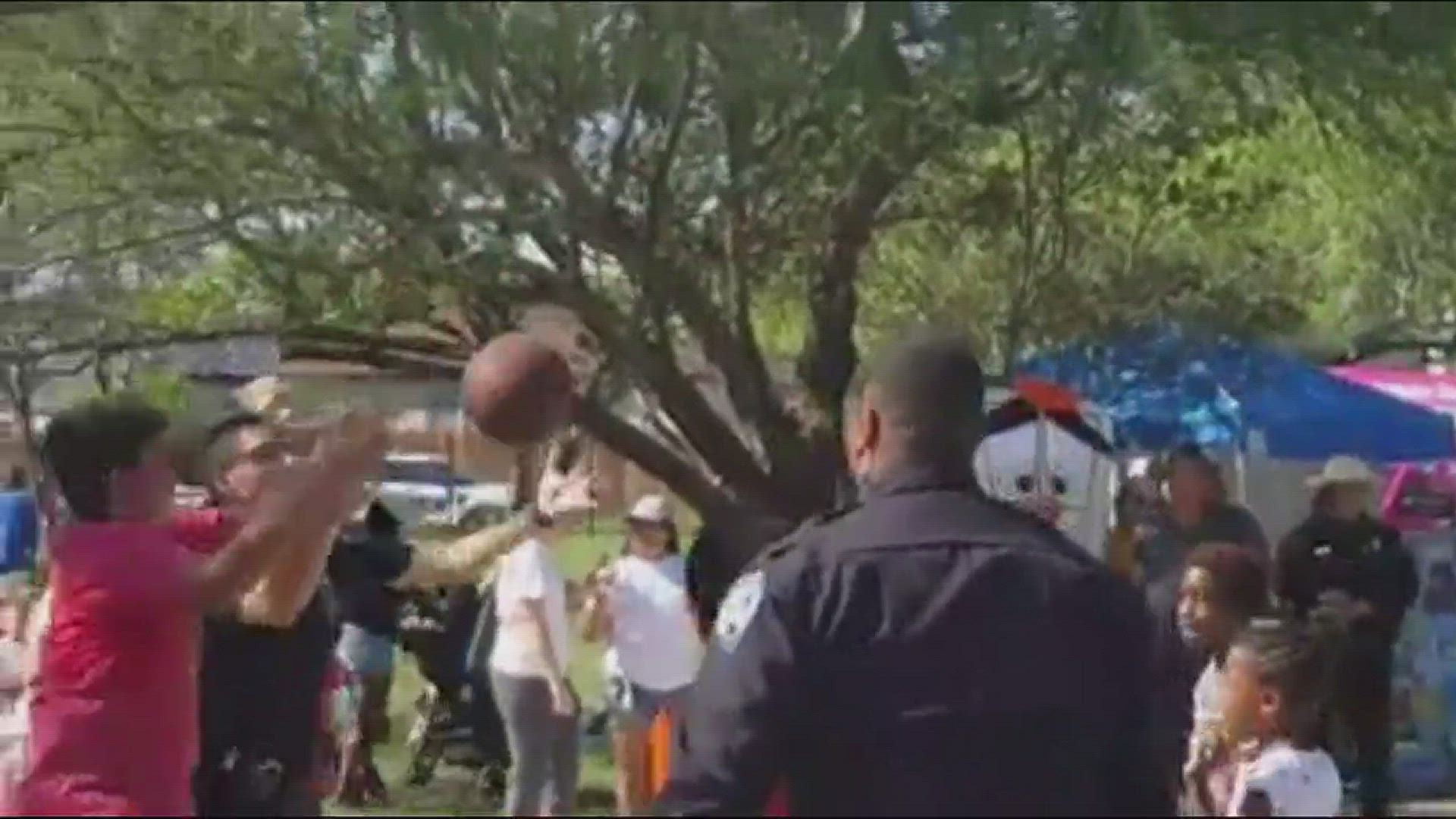 Converse Police Officers play basketball with local kids 