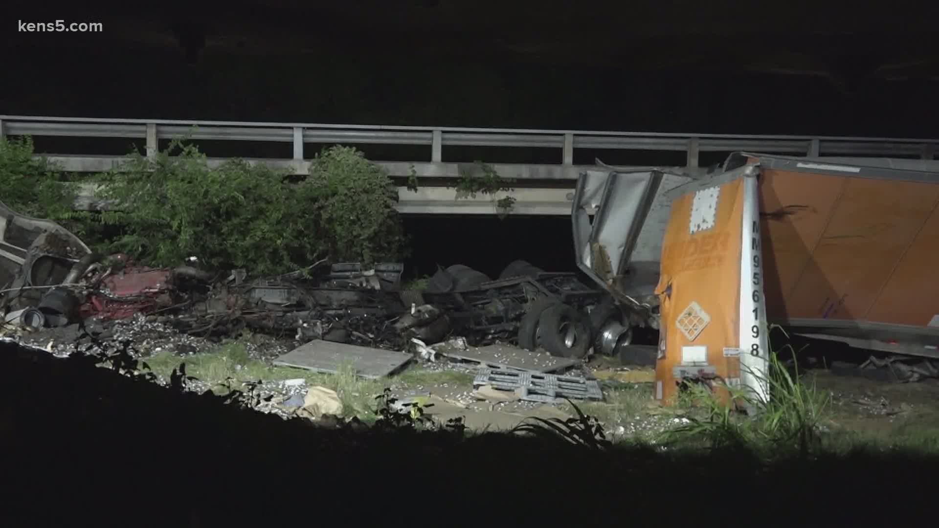 An 18-wheeler crashes, leaving behind a big, shiny mess on I-35.