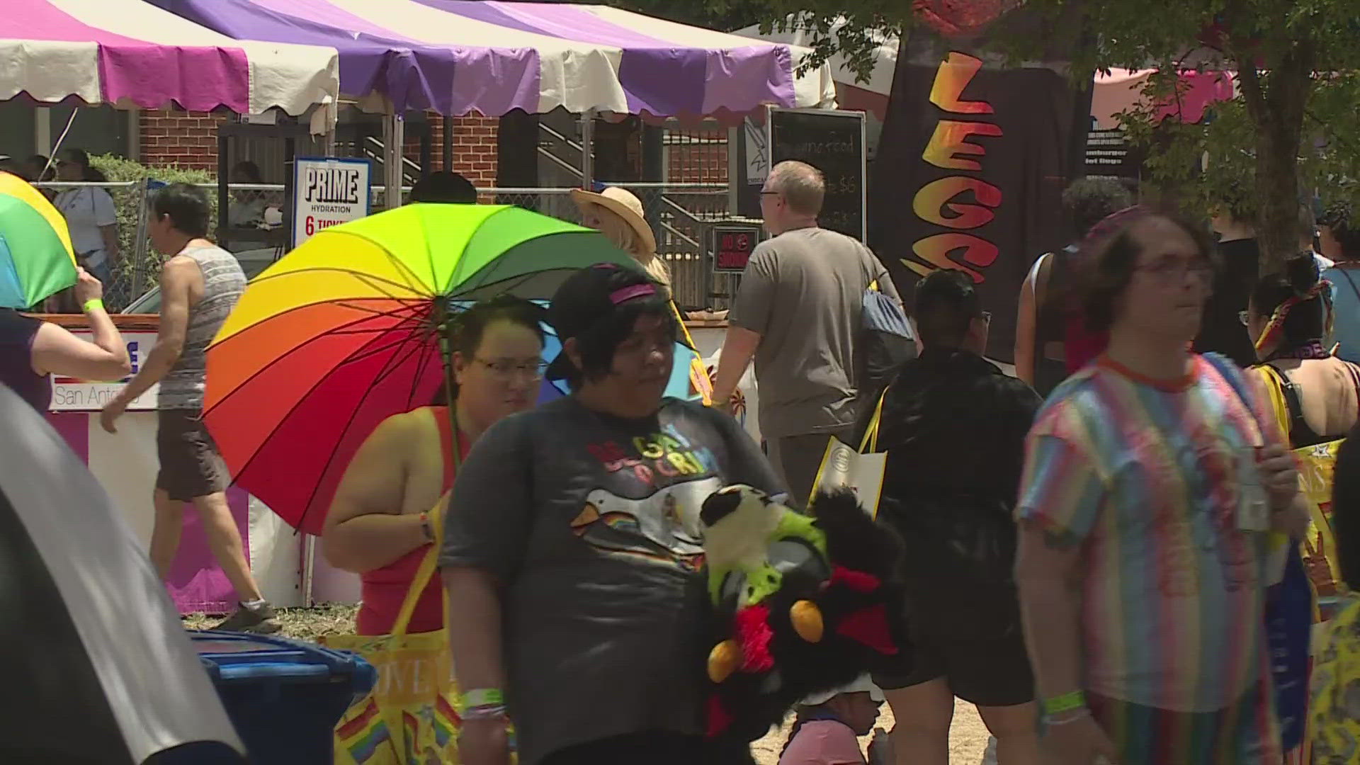 Despite the heat, many people are spending the day downtown for city's official pride celebration