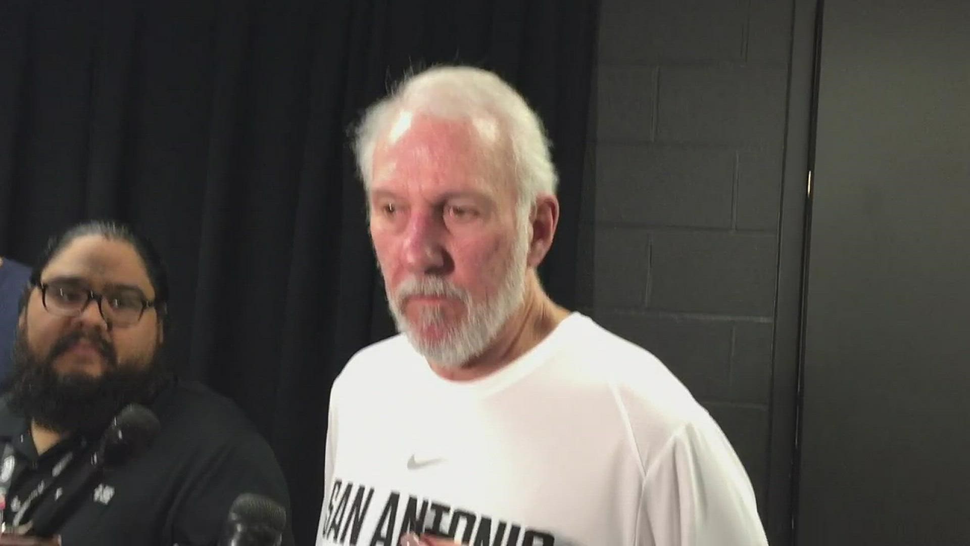 Pop talks to reporters before Tuesday night's Cavs-Spurs game