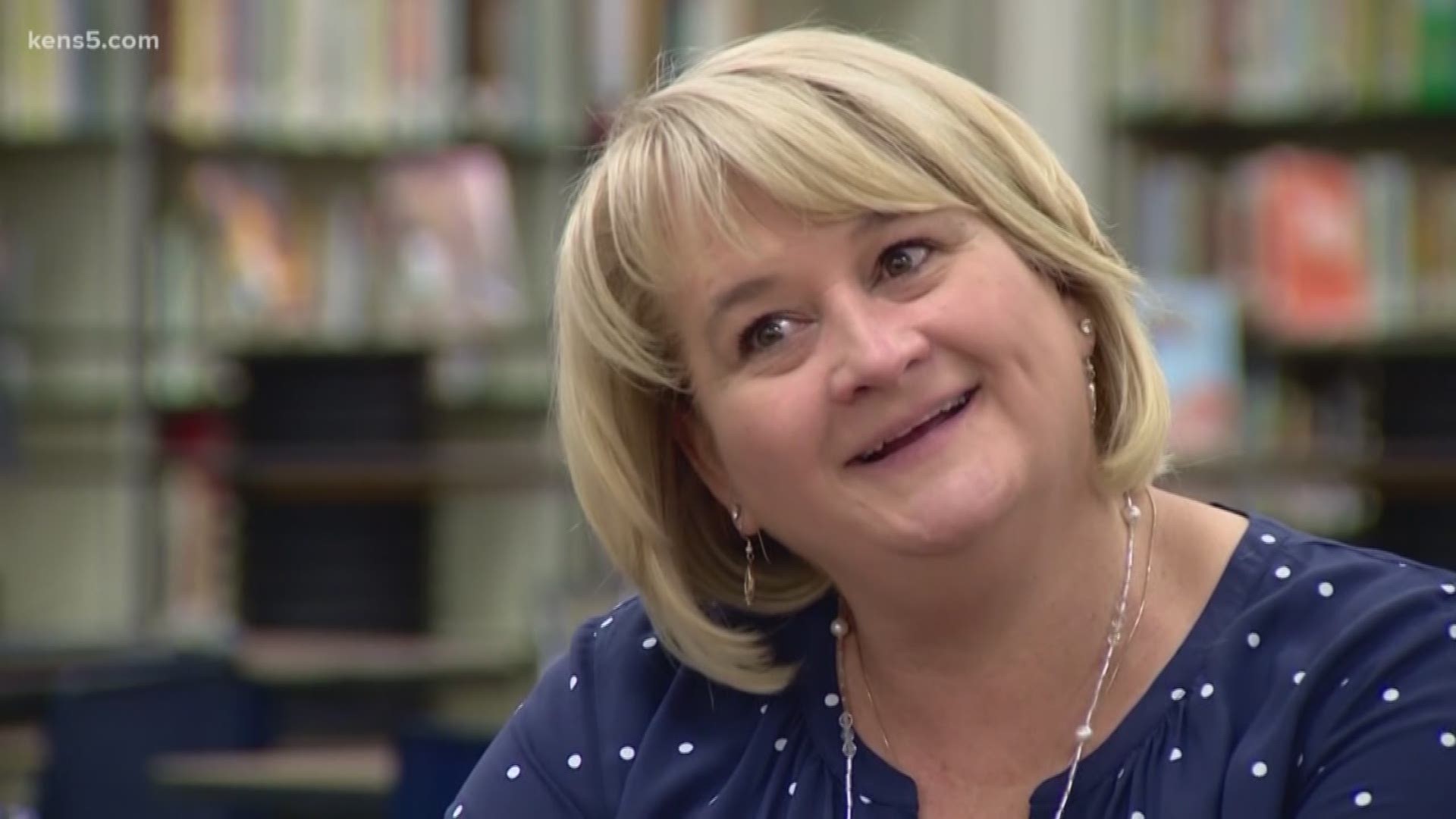 A librarian at Boerne ISD was greeted by her school's band, pep squad, and her husband as she was presented with the first Excel Award of the 2019-2020 school year.