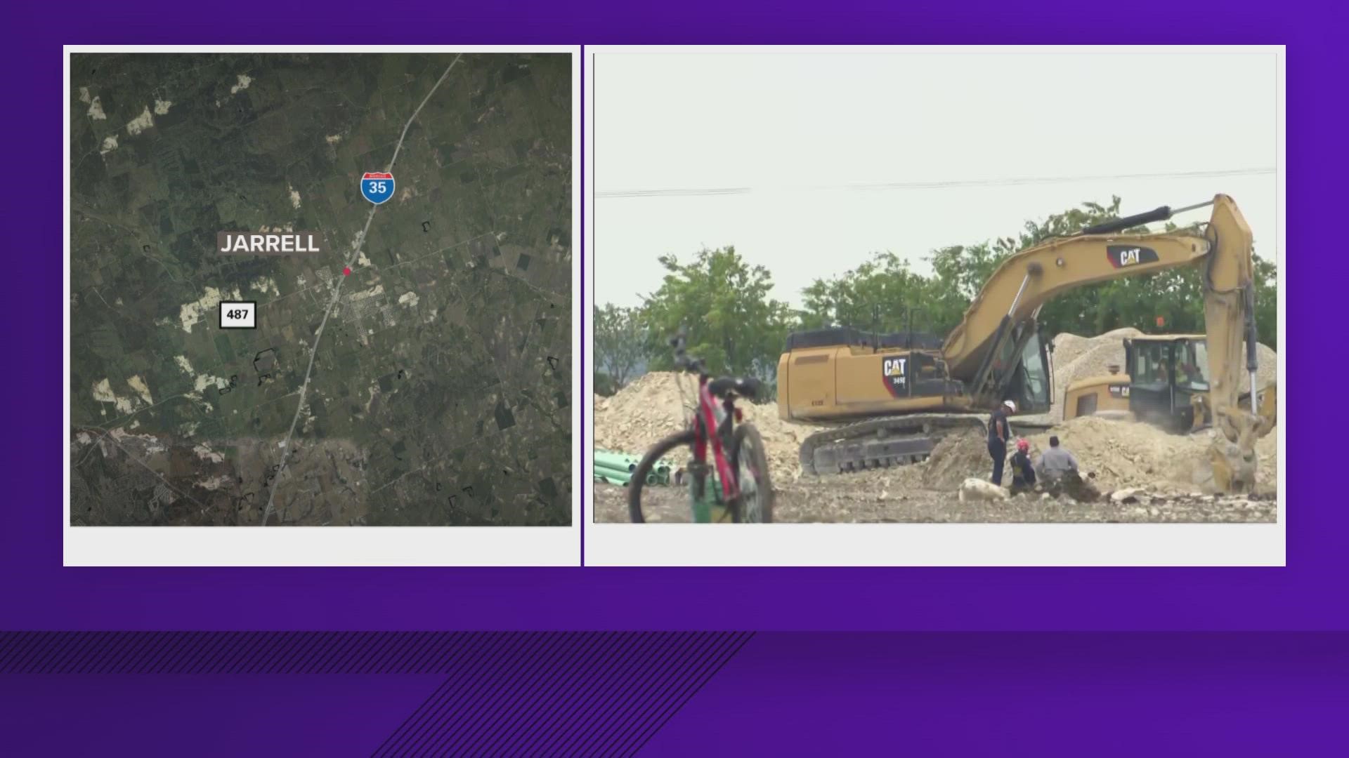 The two were buried 24 feet underground in a two-foot wide space after a trench collapsed.