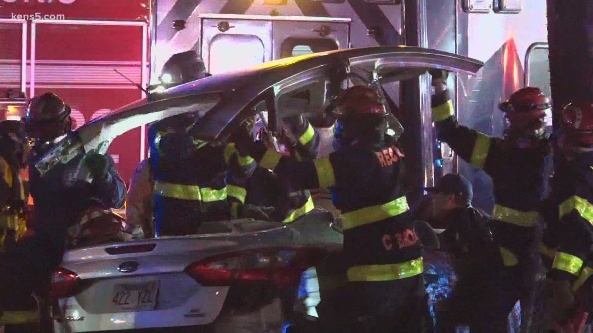 A driver is facing serious injuries after crashing into an ambulance with a patient inside.